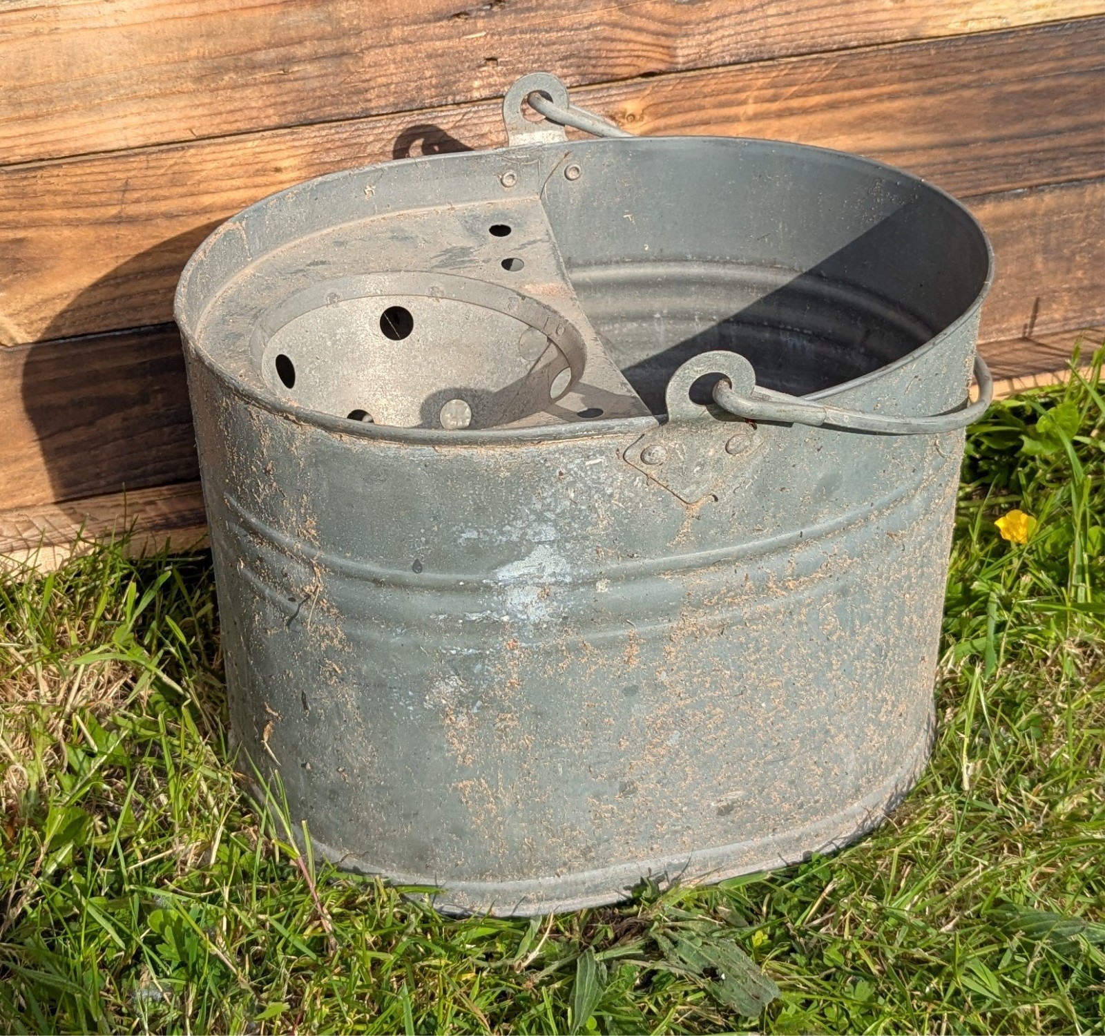 Vintage galvanised steel mop bucket