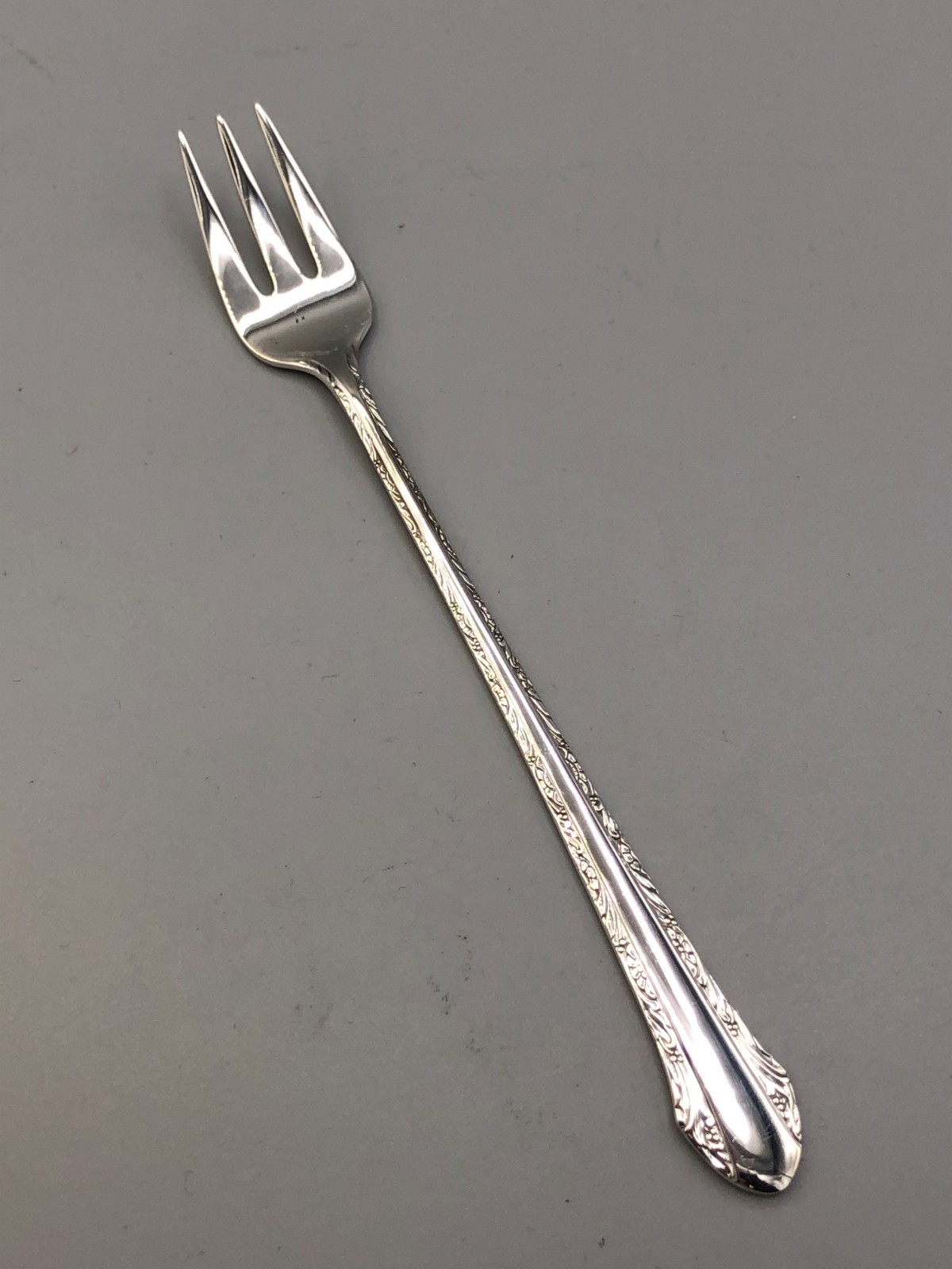 Chased Romantique by Alvin Sterling Silver single cocktail fork 5.5″