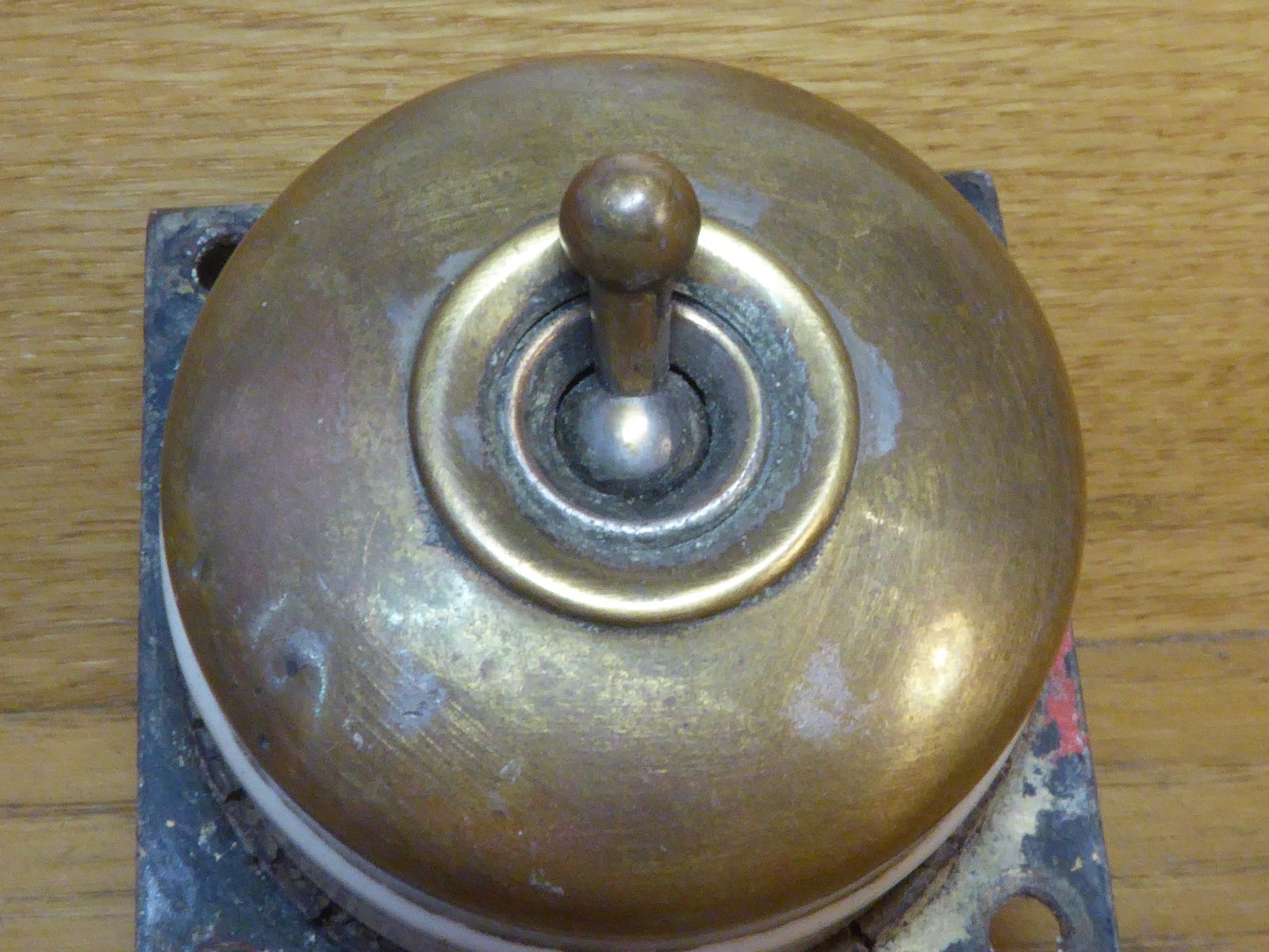Antique Crabtree Ceramic Dolly Switch with Brass cover.Single gang light switch