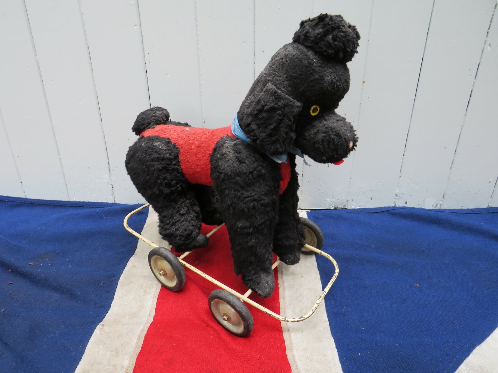DECORATIVE CHILDS STUFFED TOY BLACK FRENCH POODLE ON WHEELS VM SHOP WINDOW