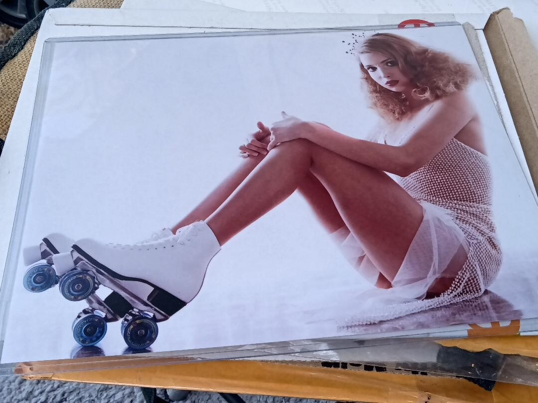 INNOCENT IVANKA TRUMP PHOTO APPROX 8 BY 10 BLACK PANTY MINX LEGS ROLLER SKATES
