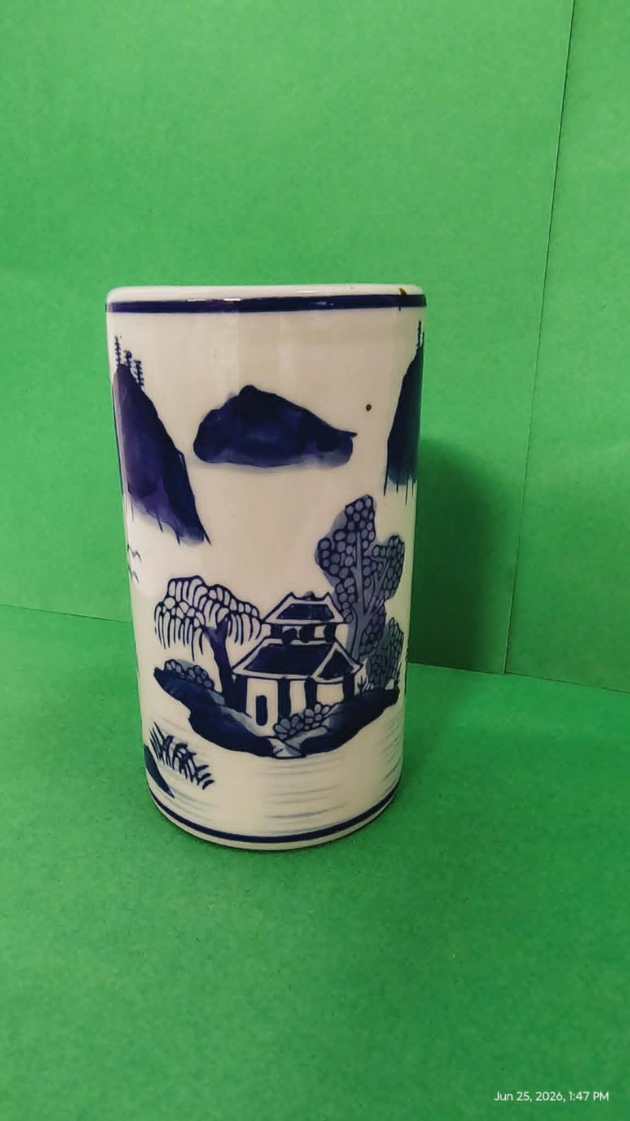 Blue/White brush pot features traditional village motive with pagodas & Mtns Vas