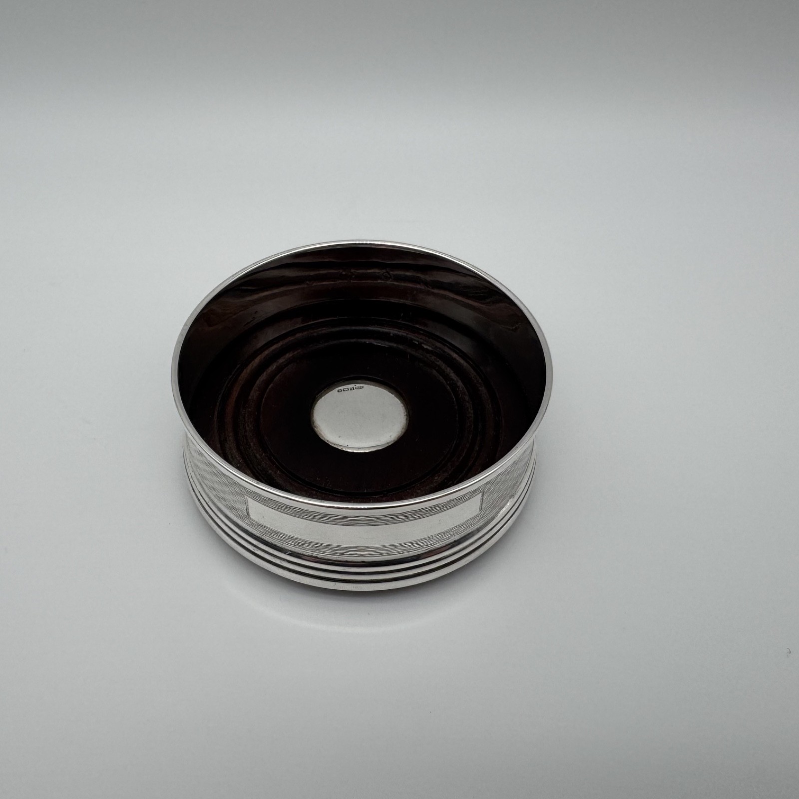 Sterling Silver and Mahogany Bottle Coaster by Broadway & Co – Birmingham 1991