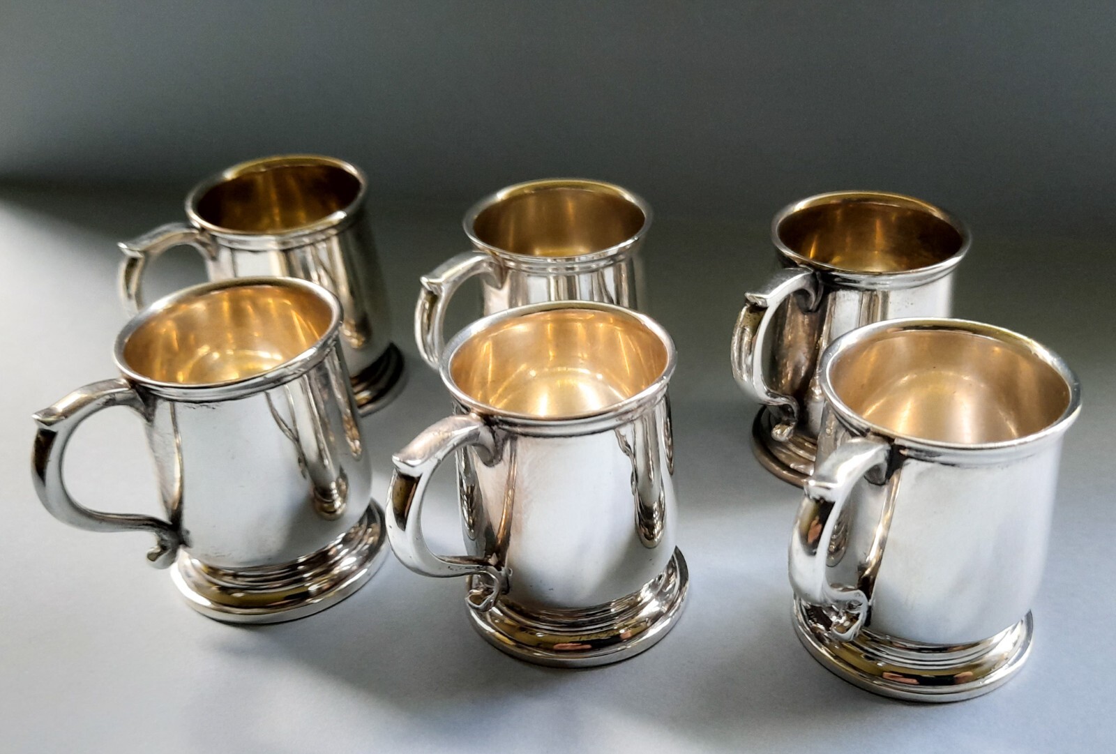Boxed set of novelty sterling silver shot cups Adie Bros Ltd, Birmingham 1923