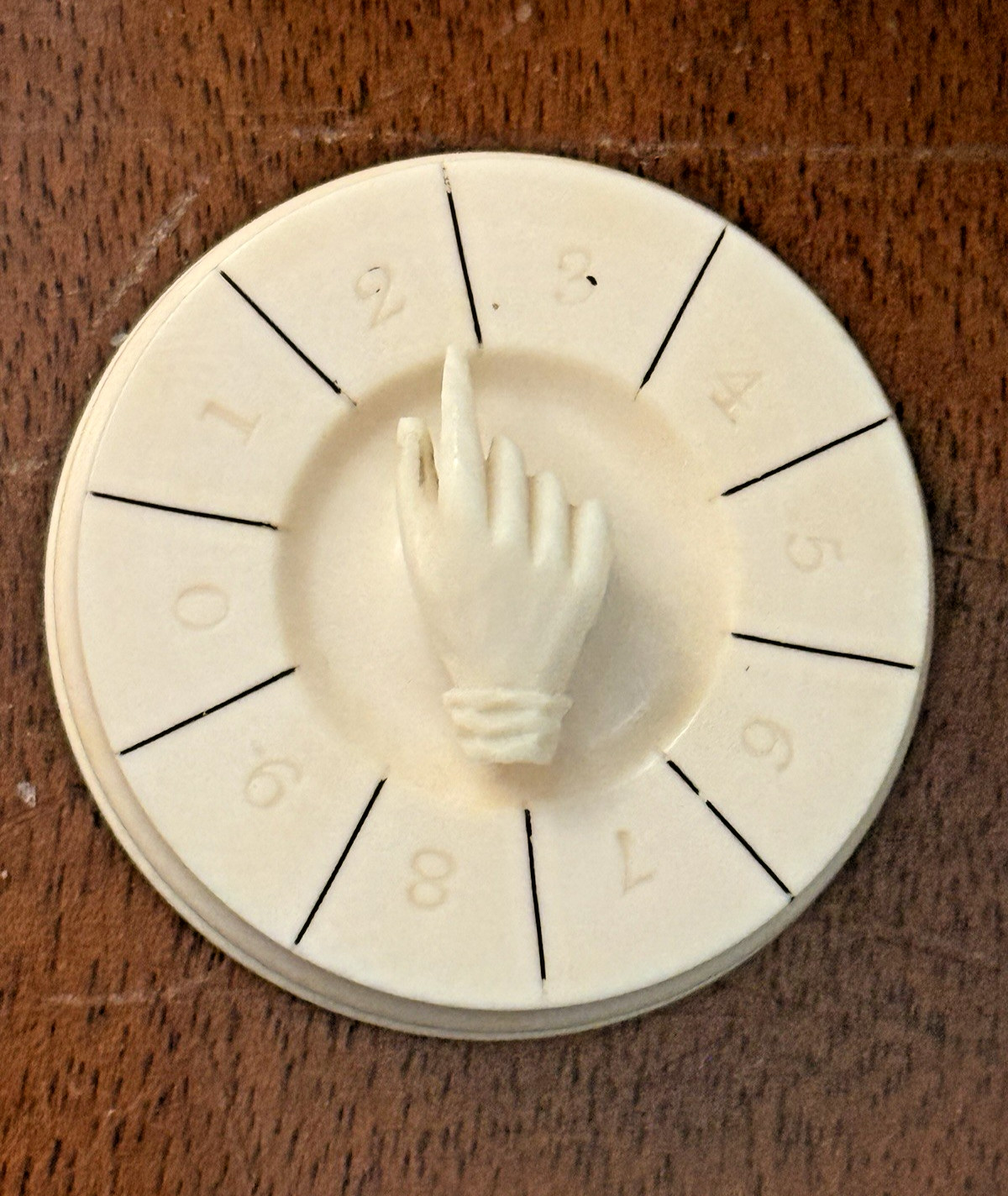 Victorian whist marker with hand-shaped pointer, 19th C.