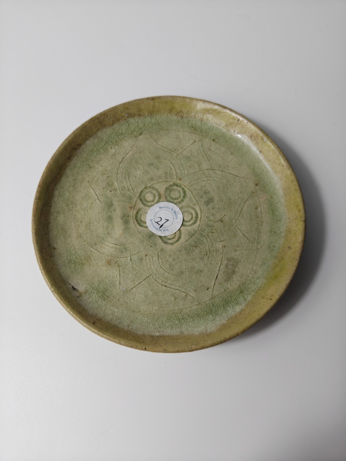 A Yuezhou Celadon Carved Dish, Southern dynasties 420-589AC