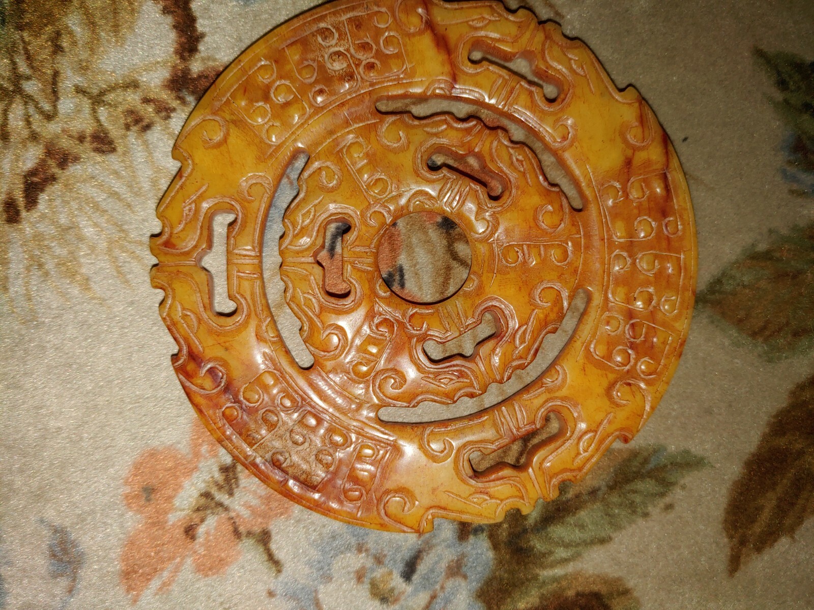 HAND CARVED JADE AMULET 4 INCHES DIAMETER BY 1/8 TH INCH THICK