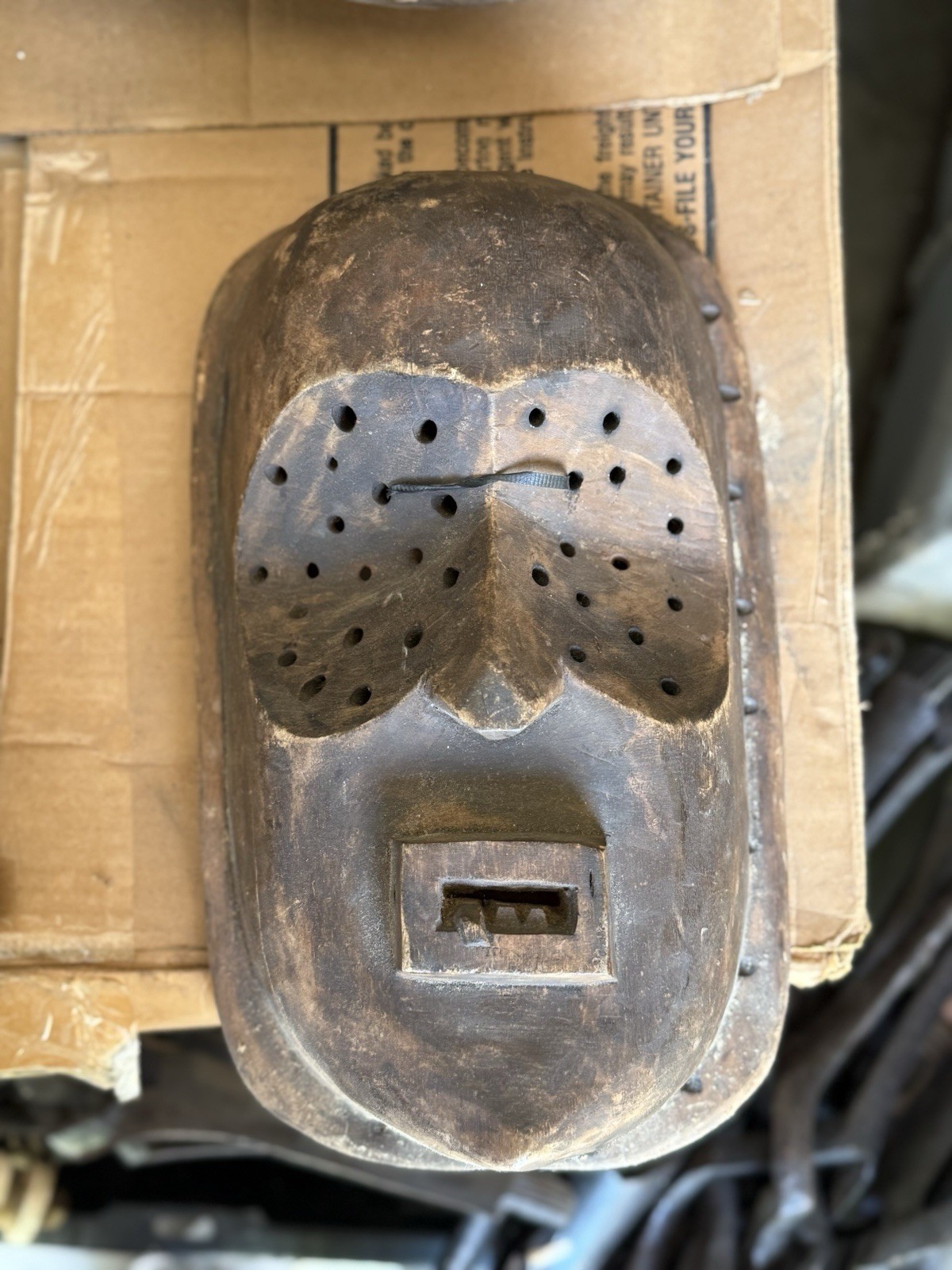 This is a Lulua tribal mask from the Democratic Republic of the Congo.