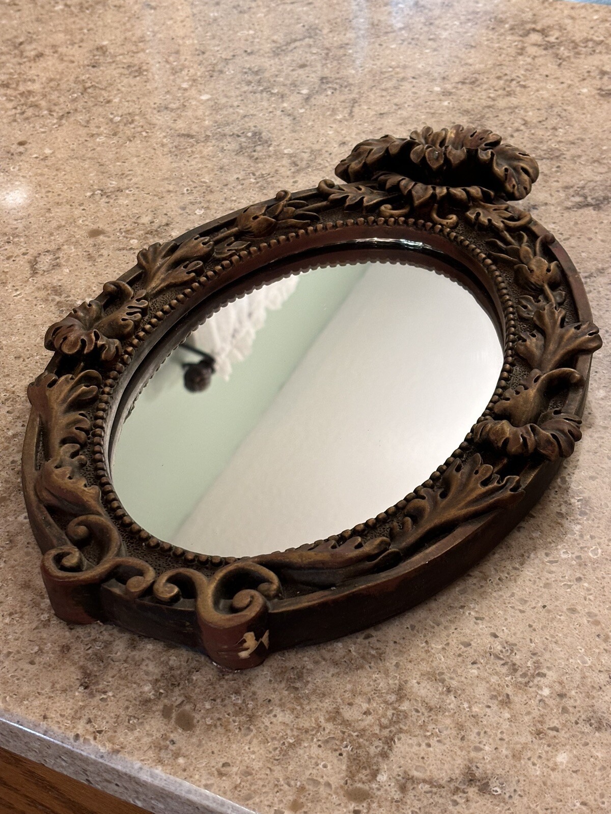 Vintage Hollywood Regency Faux Antiqued Bronze Ornate Hanging Oval Mirror