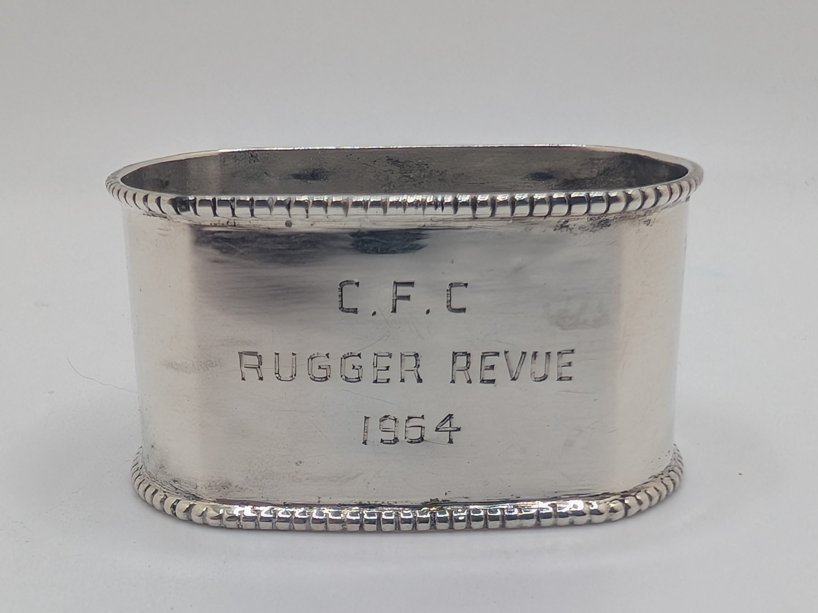 Sterling Silver Rugby Napkin Ring “CFC Rugger Review 1964” engraving, 12 grams