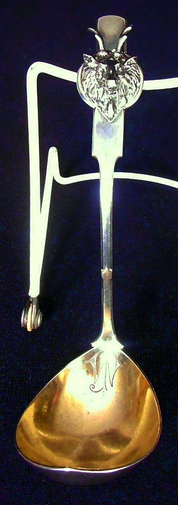 A solid silver cream ladle, Saxon Stag pattern, Gorham c.1862-67