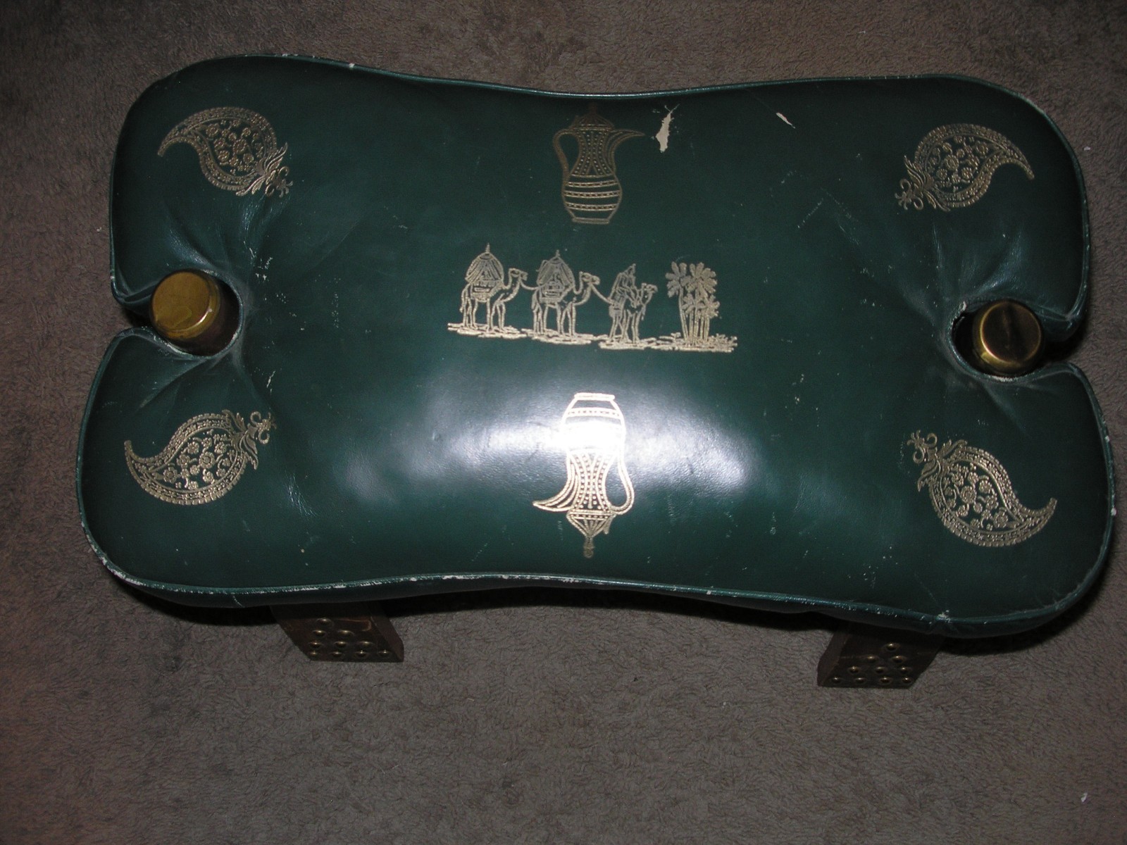 Antique camel saddle stool brass bell decorated leather seat possibly Egyptian