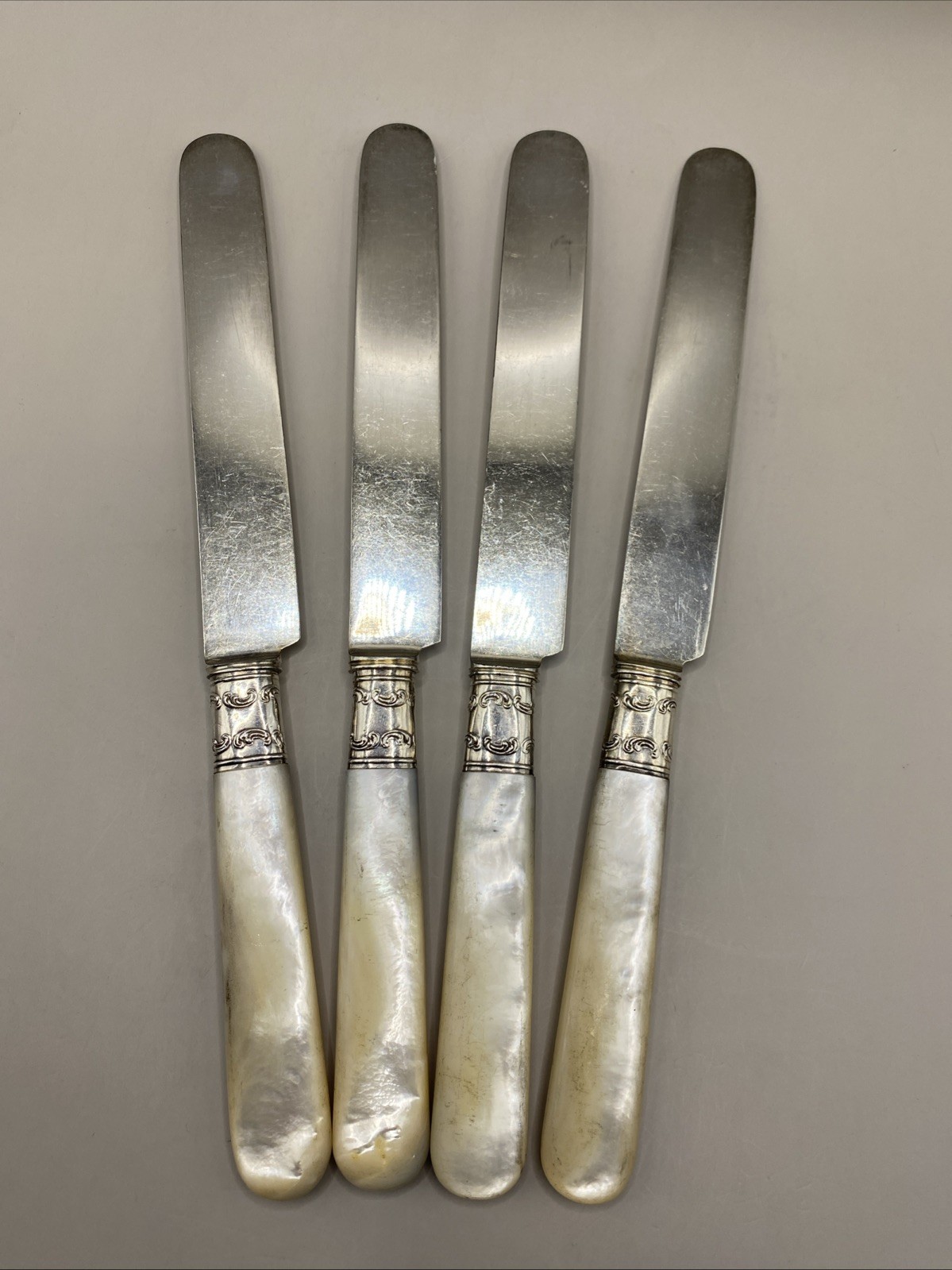 Lot of 4 Antique Landers Frary & Clark Sterling Silver Mother of Pearl Knives