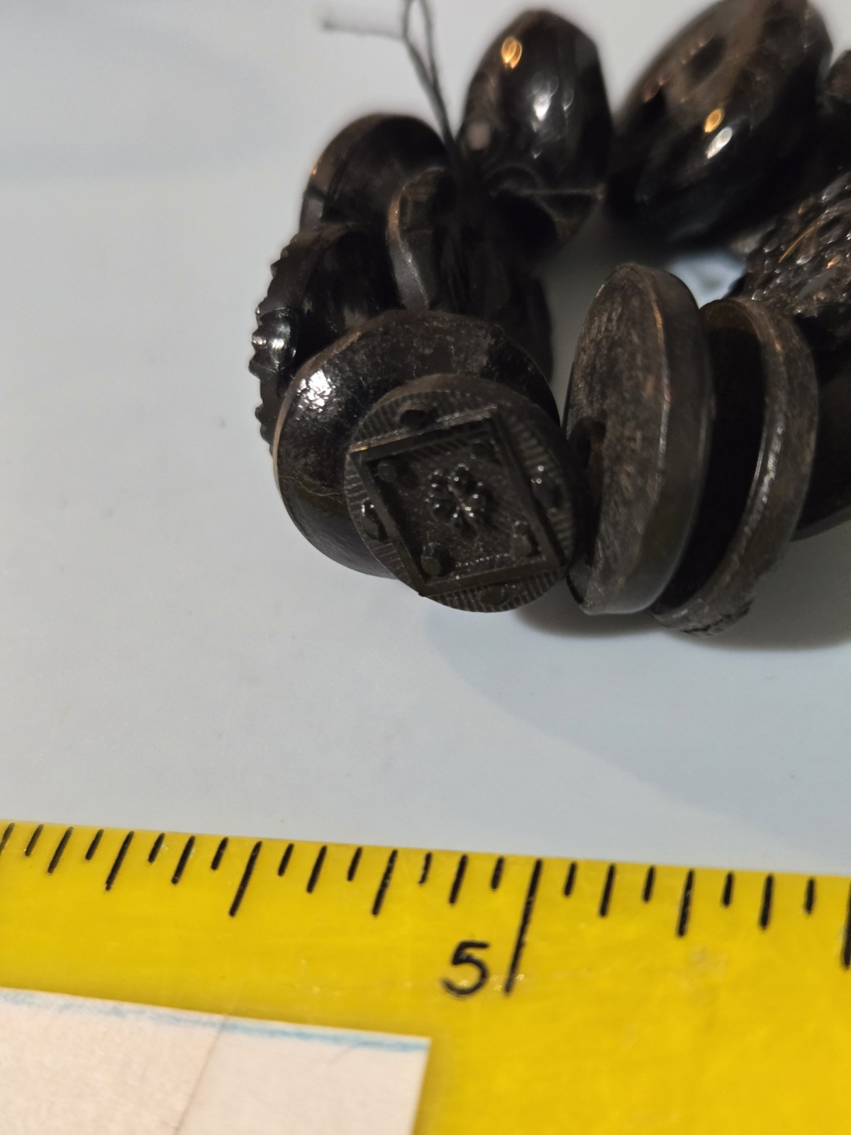 Charm String Buttons Novelty Rubber Co. Whistles Pictoral Pressed Black Glass
