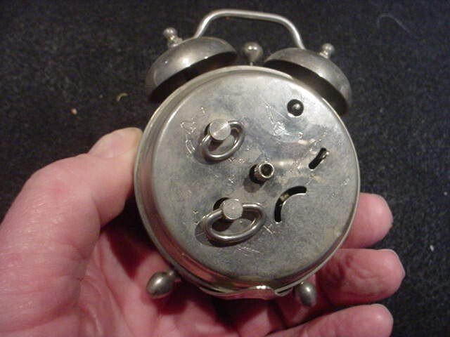 Vintage Saxony West Germany alarm clock-in a small size.