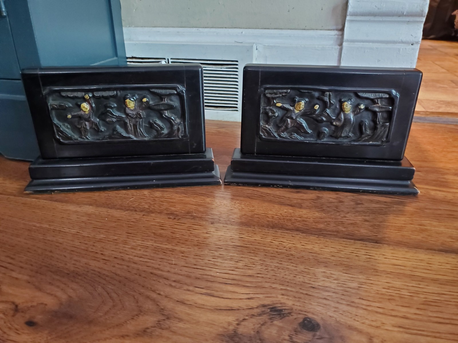 Antique Pair of Heavy Hand Carved Wooden Bookends with Asian Features