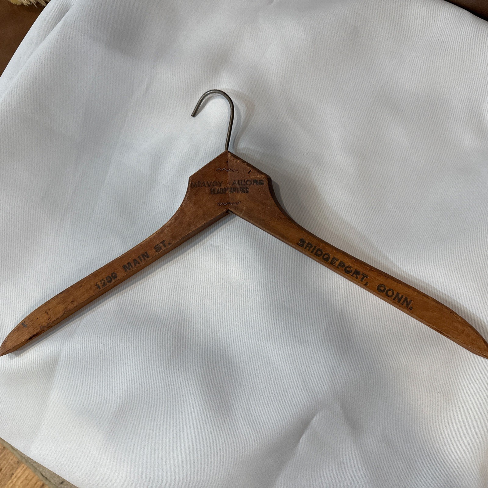 Antique wooden hanger Bridgeport Connecticut From MCAVOY Taylor’s headquarters
