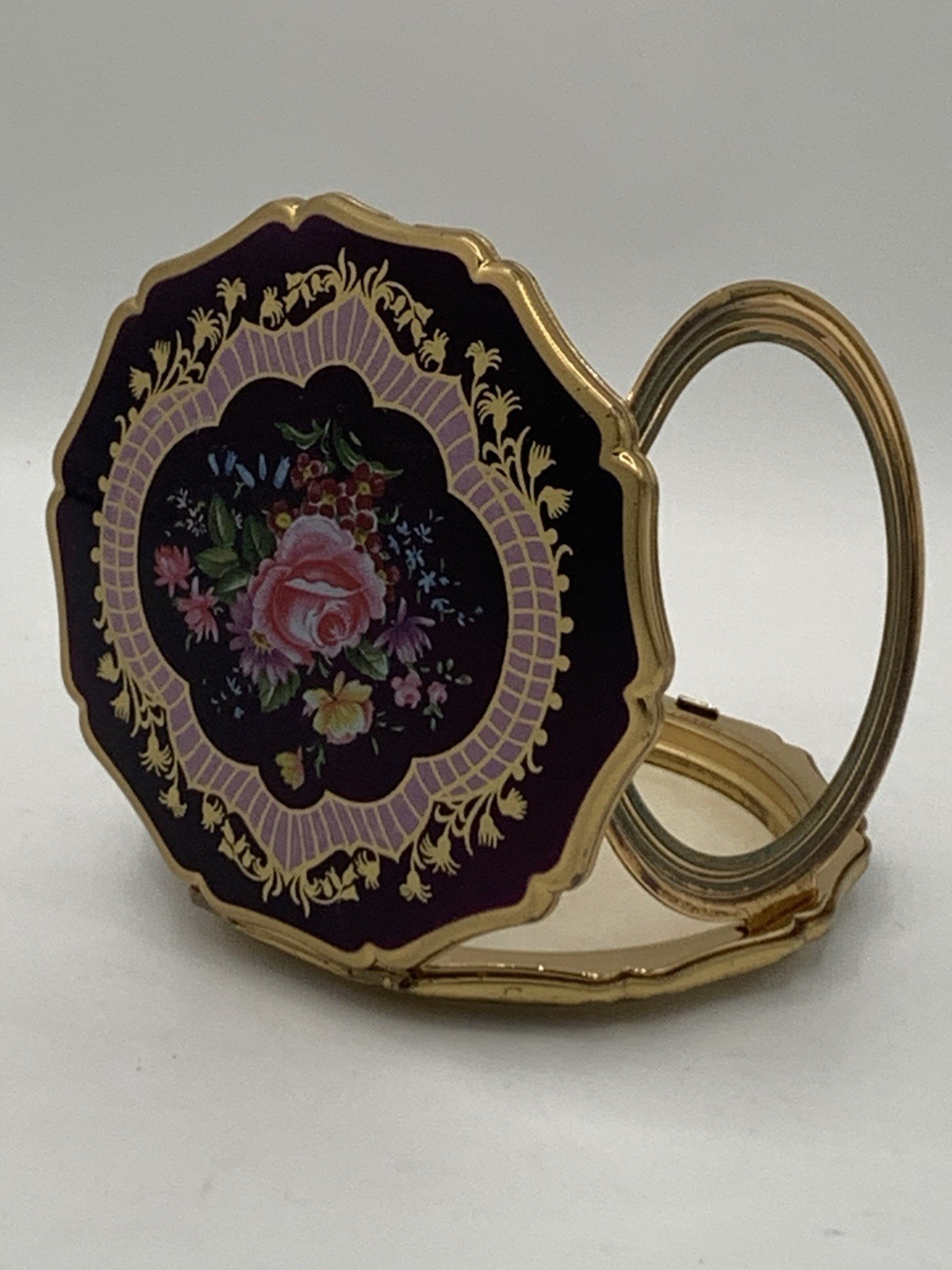 VINTAGE STRATTON POWDER COMPACT, PINK ROSE FLOWERY GRAPHIC, MADE IN ENGLAND.