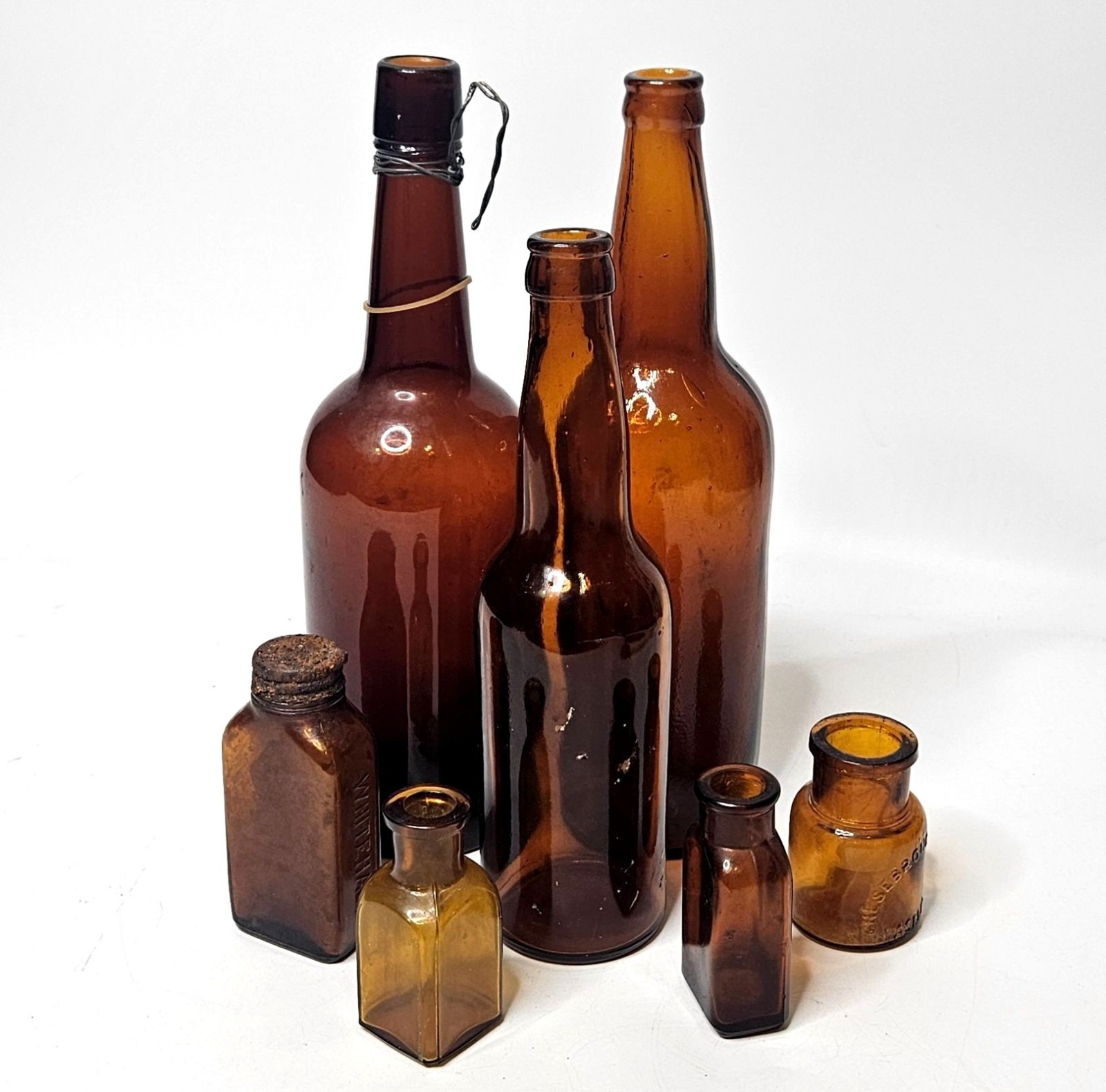Lot of 7 Dug Antique Amber Glass Bottles Apothecary Liquor Pharmacy Vaseline