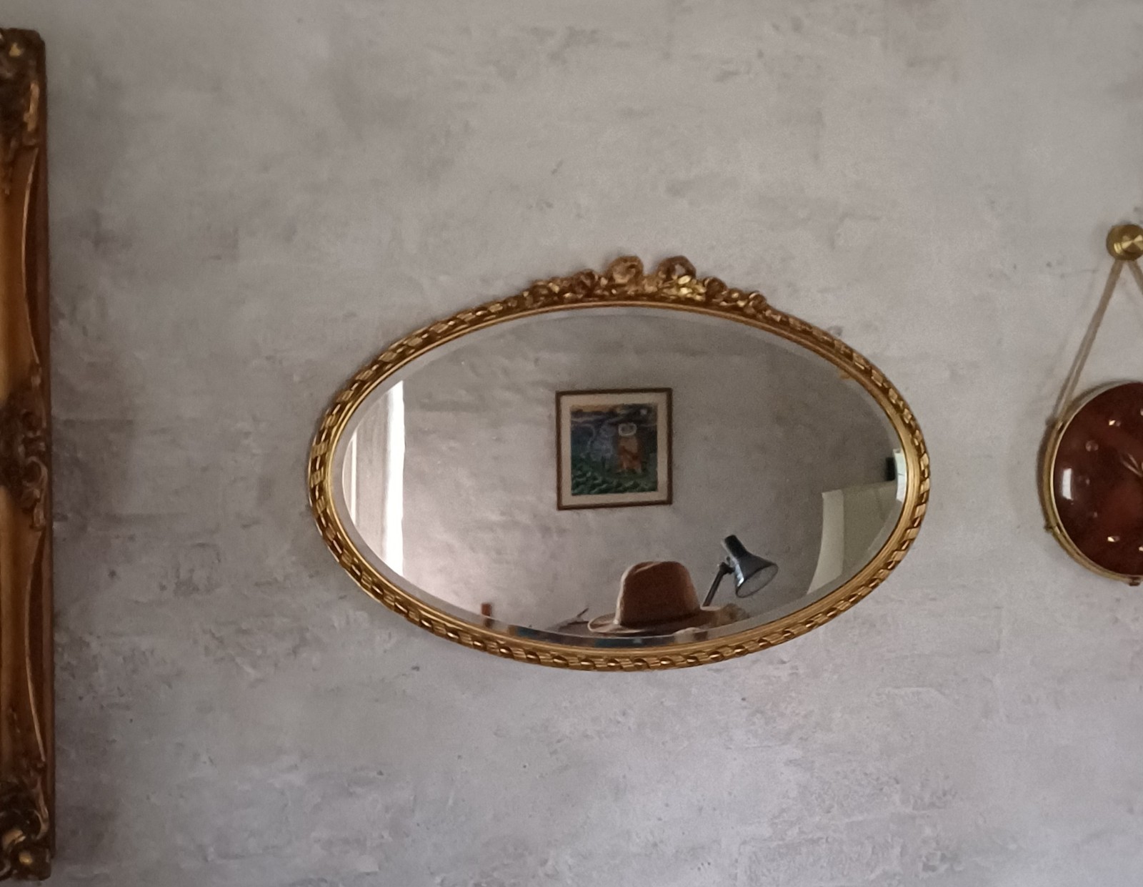 Prince Regent Regency style mirror / oval / gilt and swags / 72 x 47cm