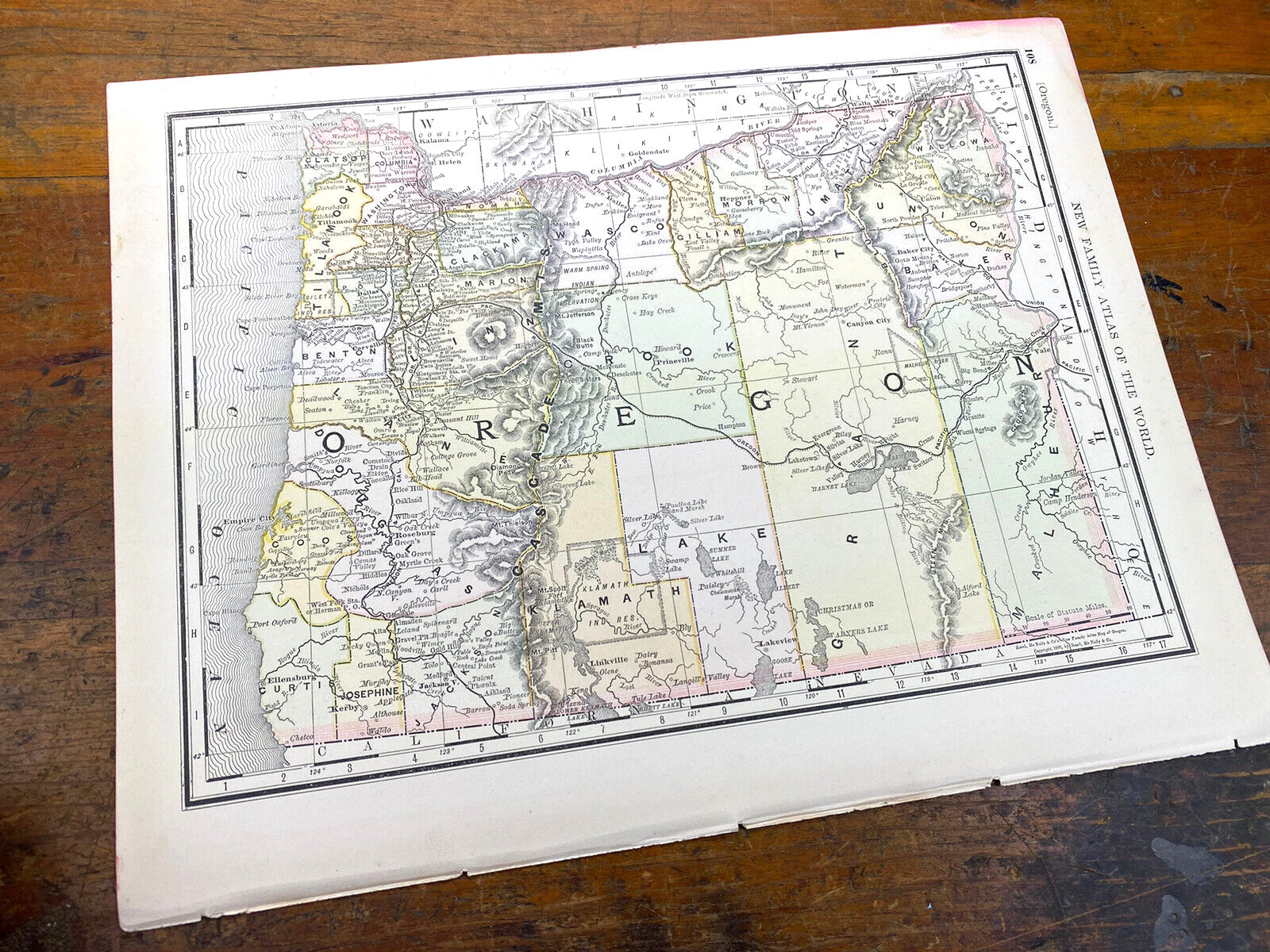 1890 Oregon Map w/ Idaho on Reverse, 14 1/8″ x 10 7/8″ Colored Counties