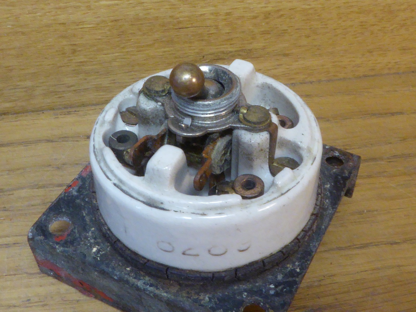 Antique Crabtree Ceramic Dolly Switch with Brass cover.Single gang light switch