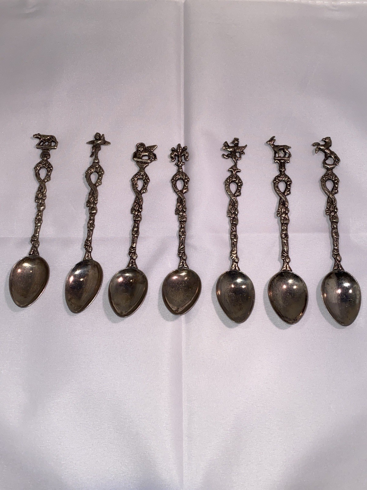 Set of 7 Montagnani Style Italy Stamped Figural Demitasse Spoons Ornate Vintage