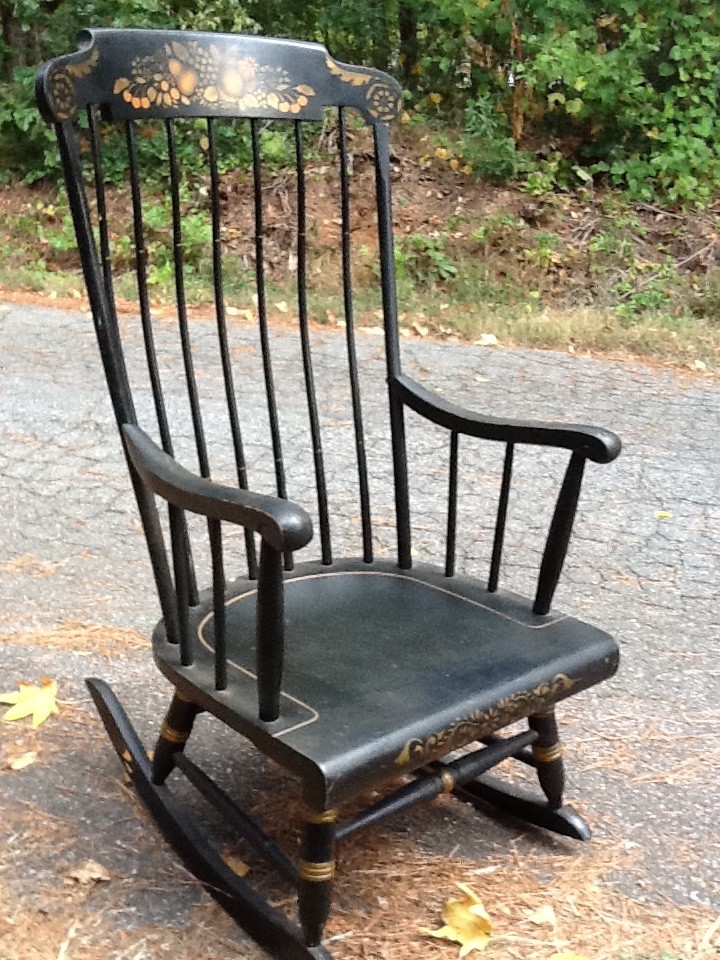 Vintage black rocking chair with fruit, pre-owned, scuffed on armrest