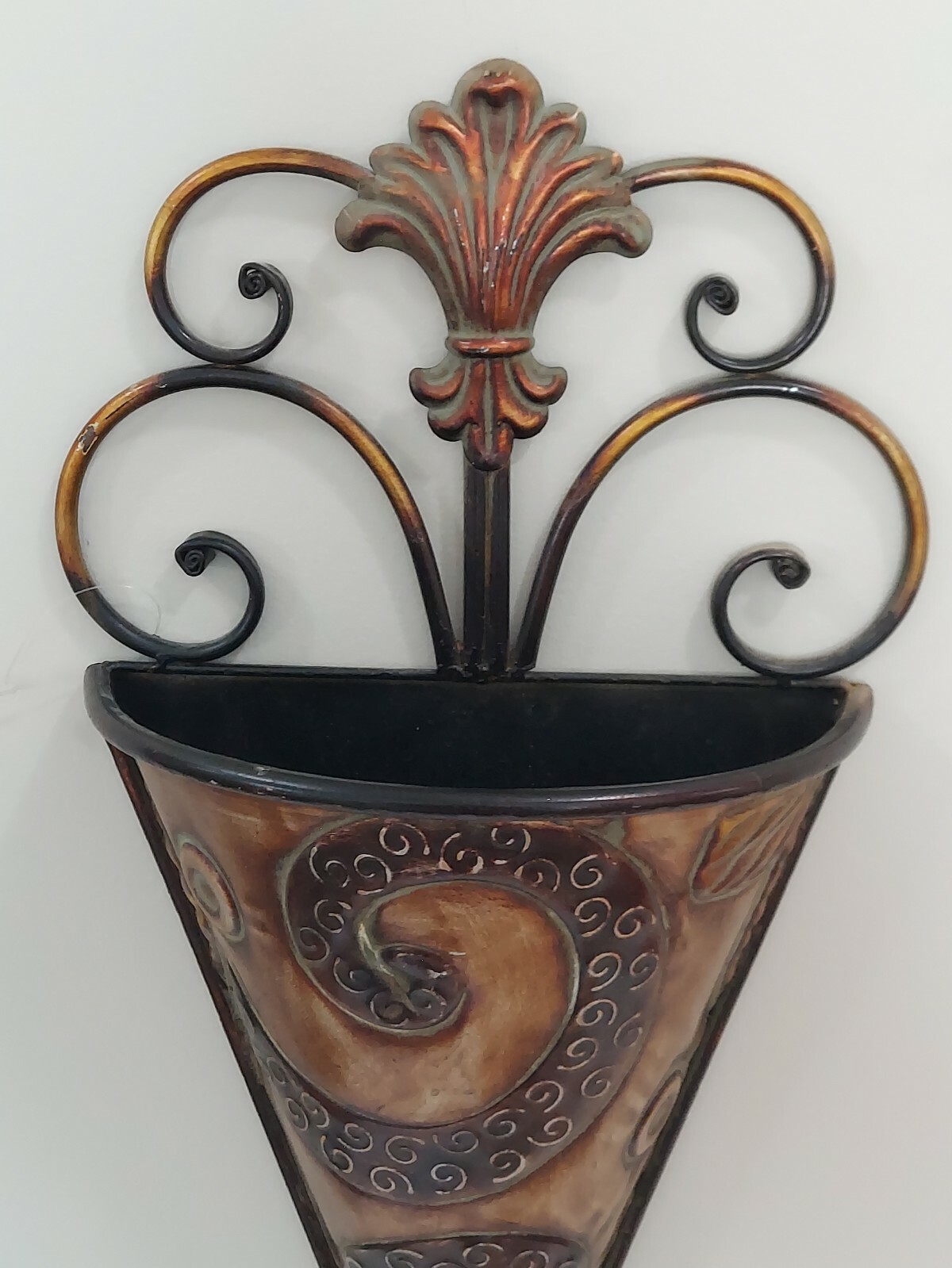 Large scroll work metal wall scone