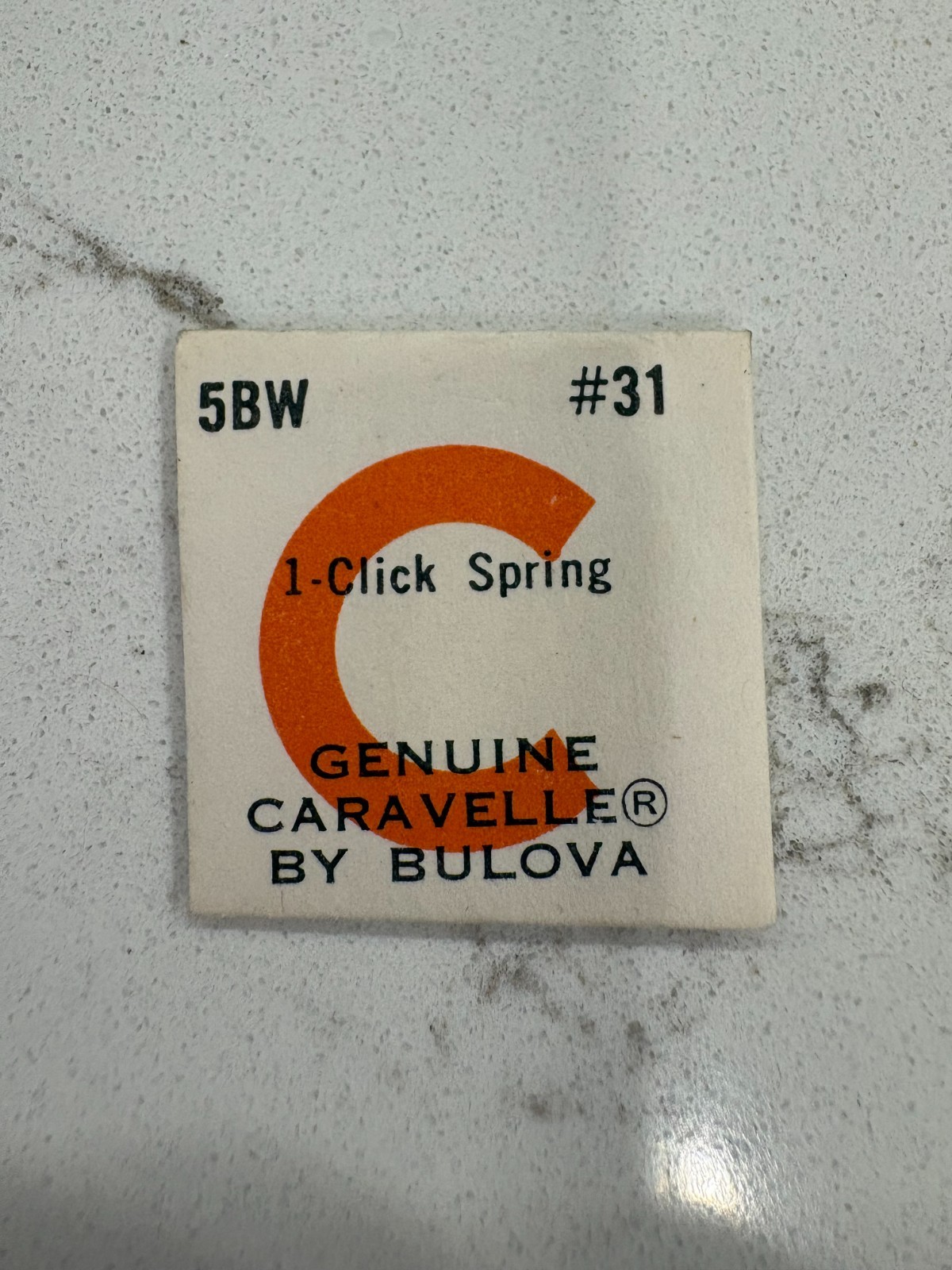 NOS Vintage Caravelle by Bulova Watch Part #31 5BW 1-Click Spring (unopened)