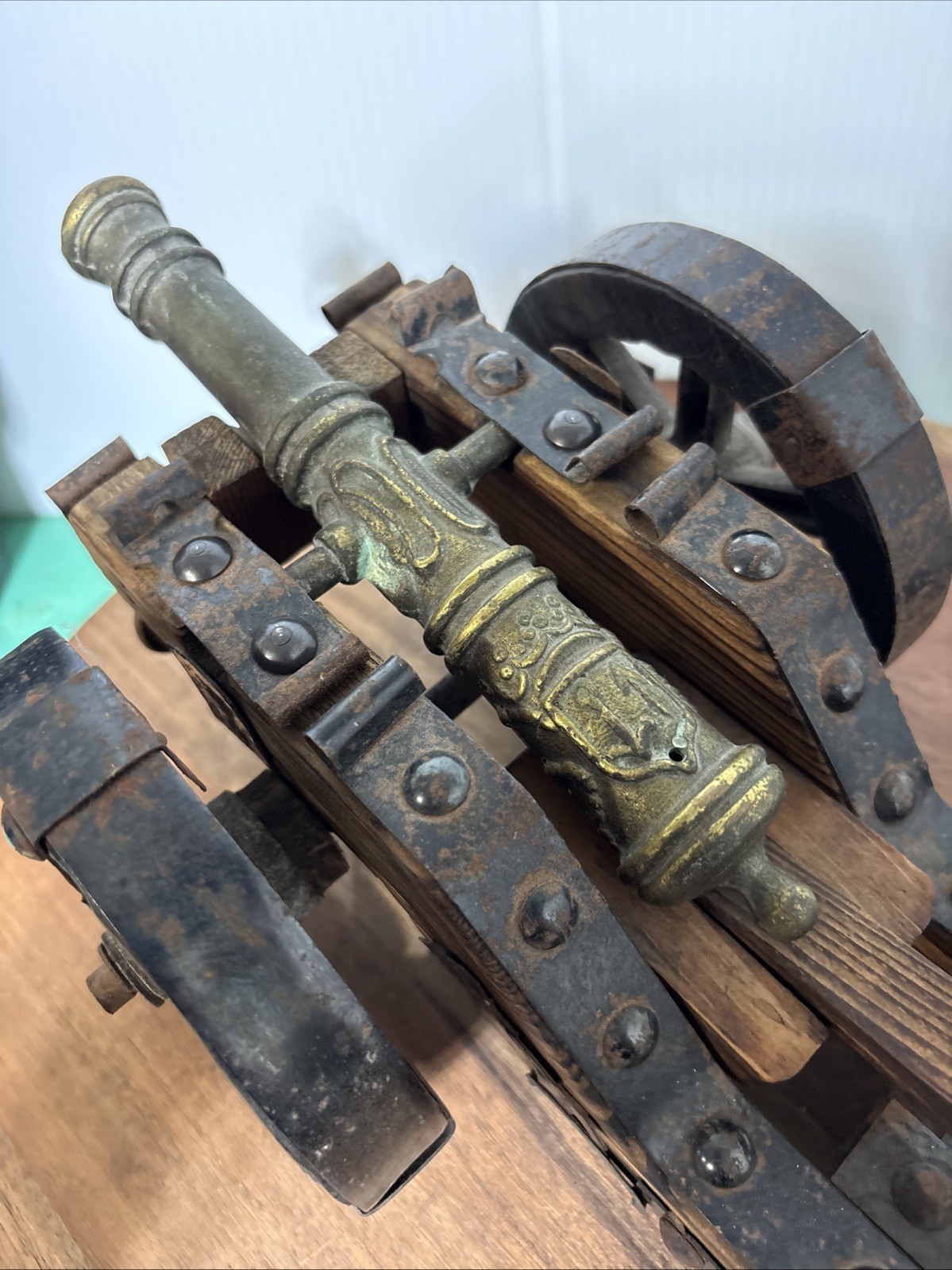 Vintage Spanish cannon replica wood base and copper cannon and steel studs