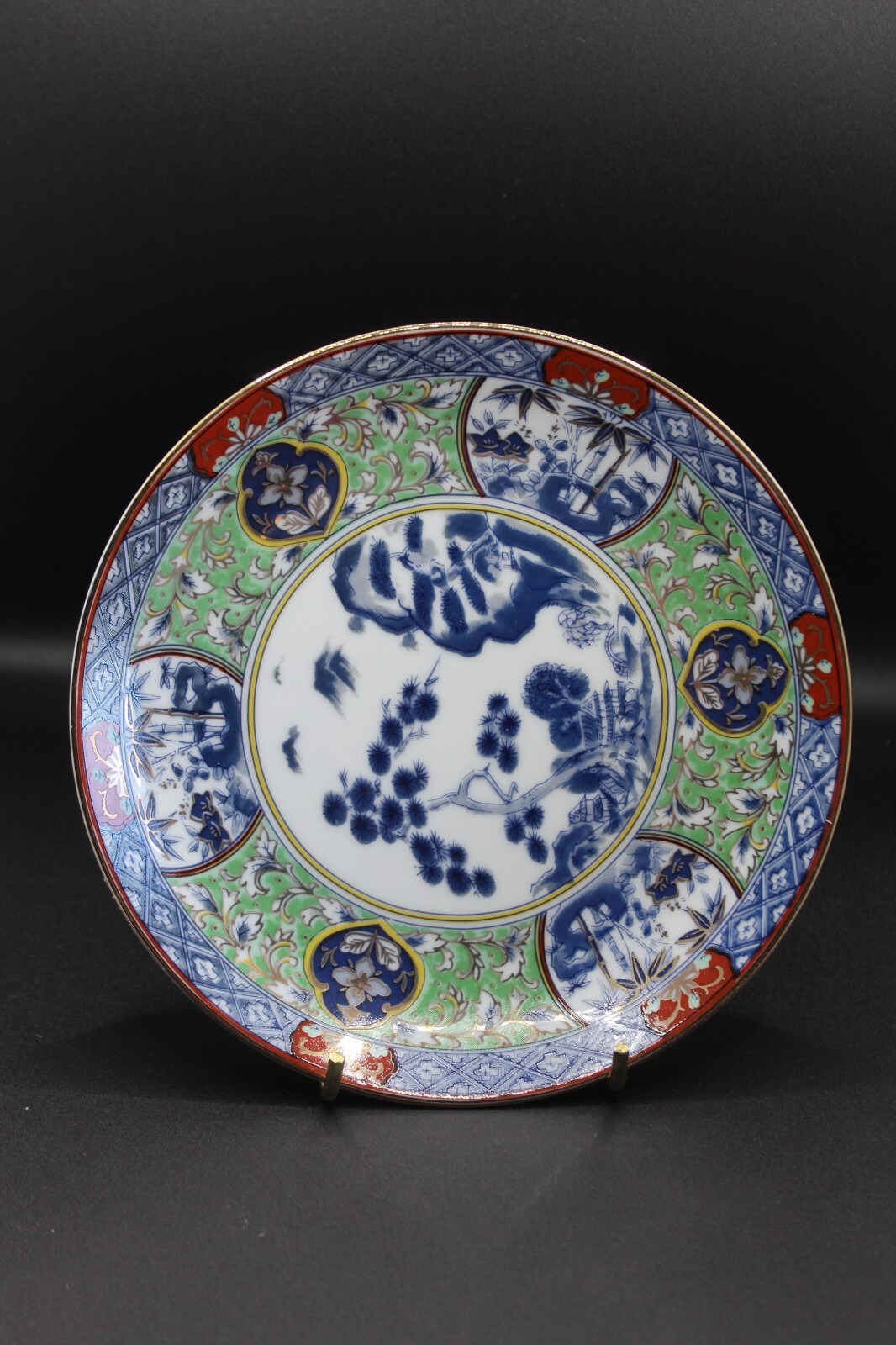 Vintage Japanese Imari Arita Ware display plate, blue, green red and gold.