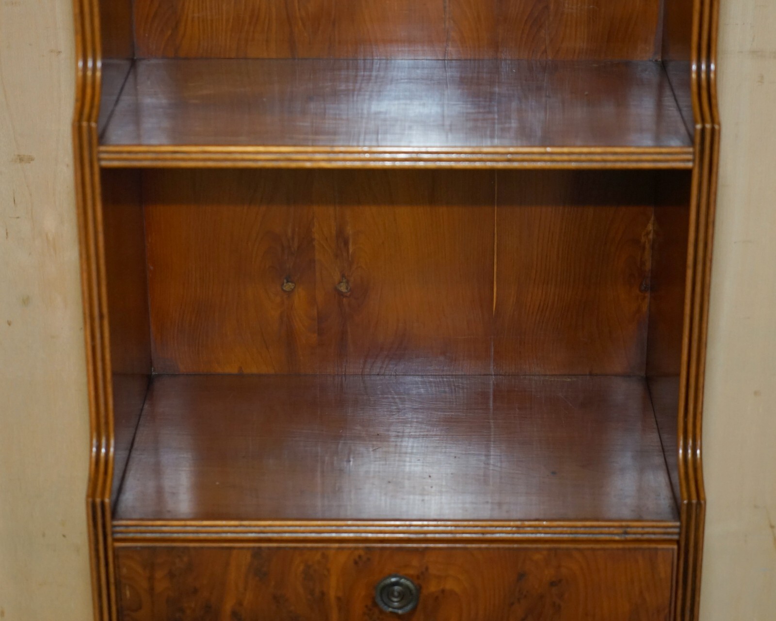 PAIR OF VINTAGE ENGLISH FLAMED MAHOGANY WATERFALL BOOKCASES WITH CUPBOARD BASES