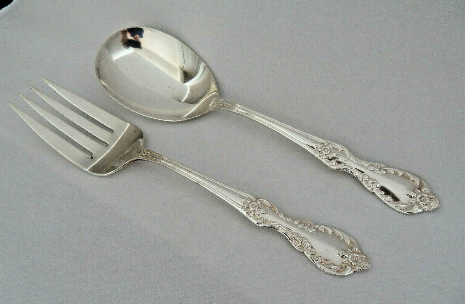 2 Piece Wm. Rogers “Grand Elegance” Silver Plate Meat Fork & Vegetable Spoon