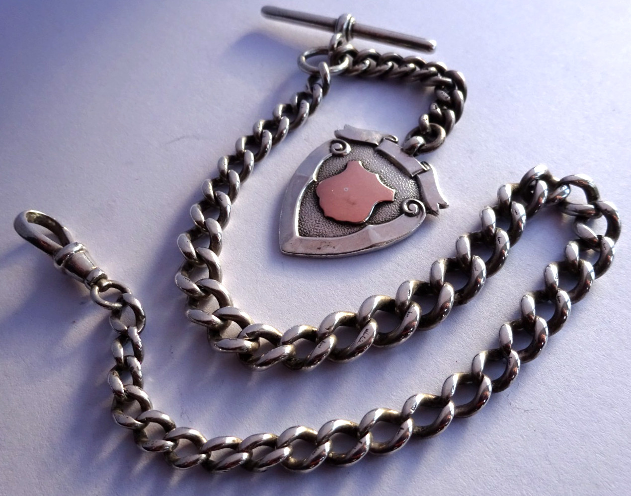 Antique solid silver pocket watch albert chain w/ silver & gold fob medal