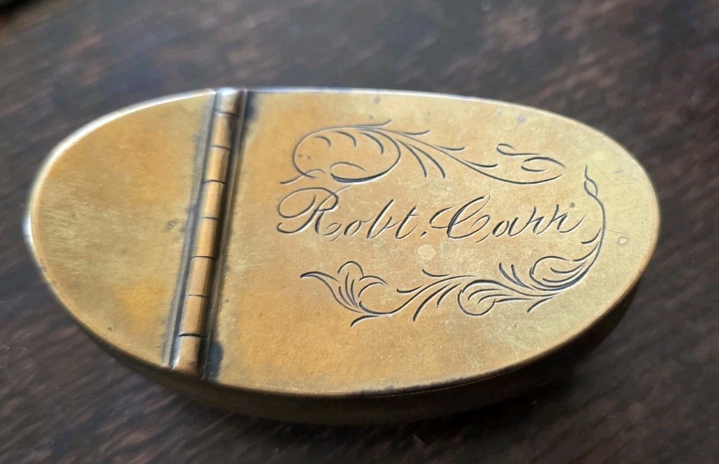 Mid 19thc oval pocket size brass snuff box engraved ‘Robert Carr’