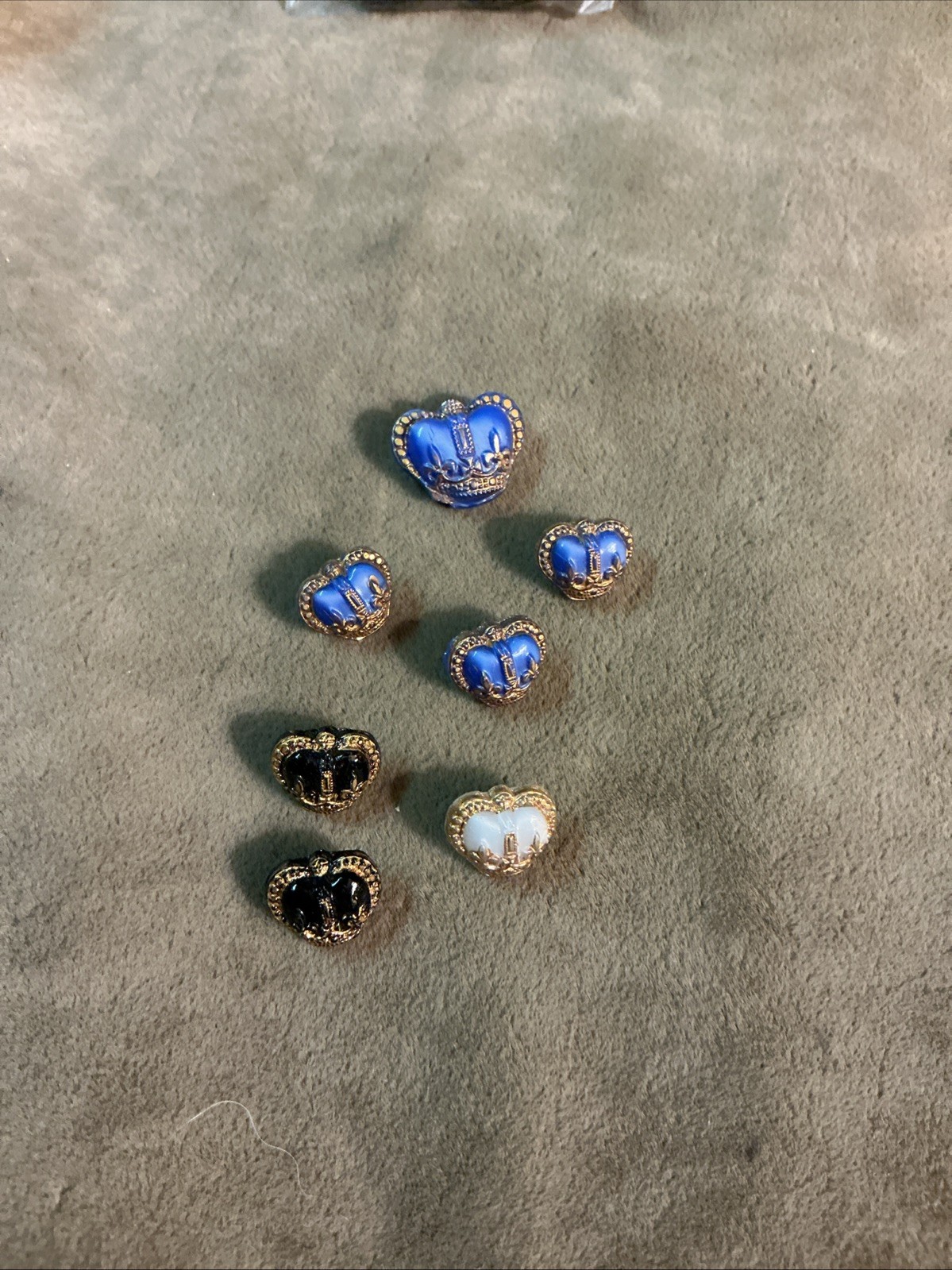 Antique glass clothes button lot of seven pieces crown design with gilt trim