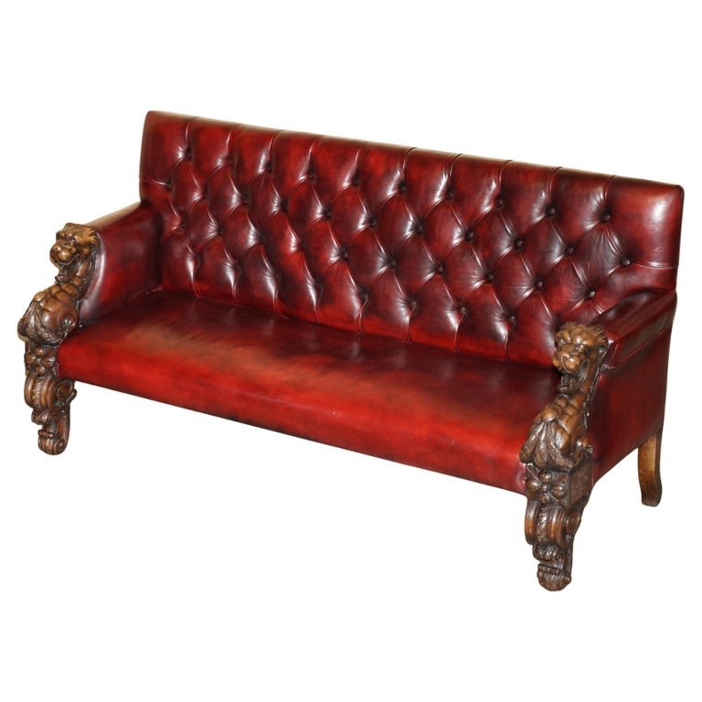 RARE LION’ HEAD HAND CARVED ANTIQUE VICTORIAN CHESTERFIELD OXBLOOD LEATHER SOFA