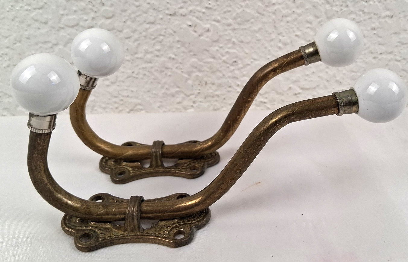 2 Vintage Double Wall Hook Ornate Solid Brass and Old Porcelain