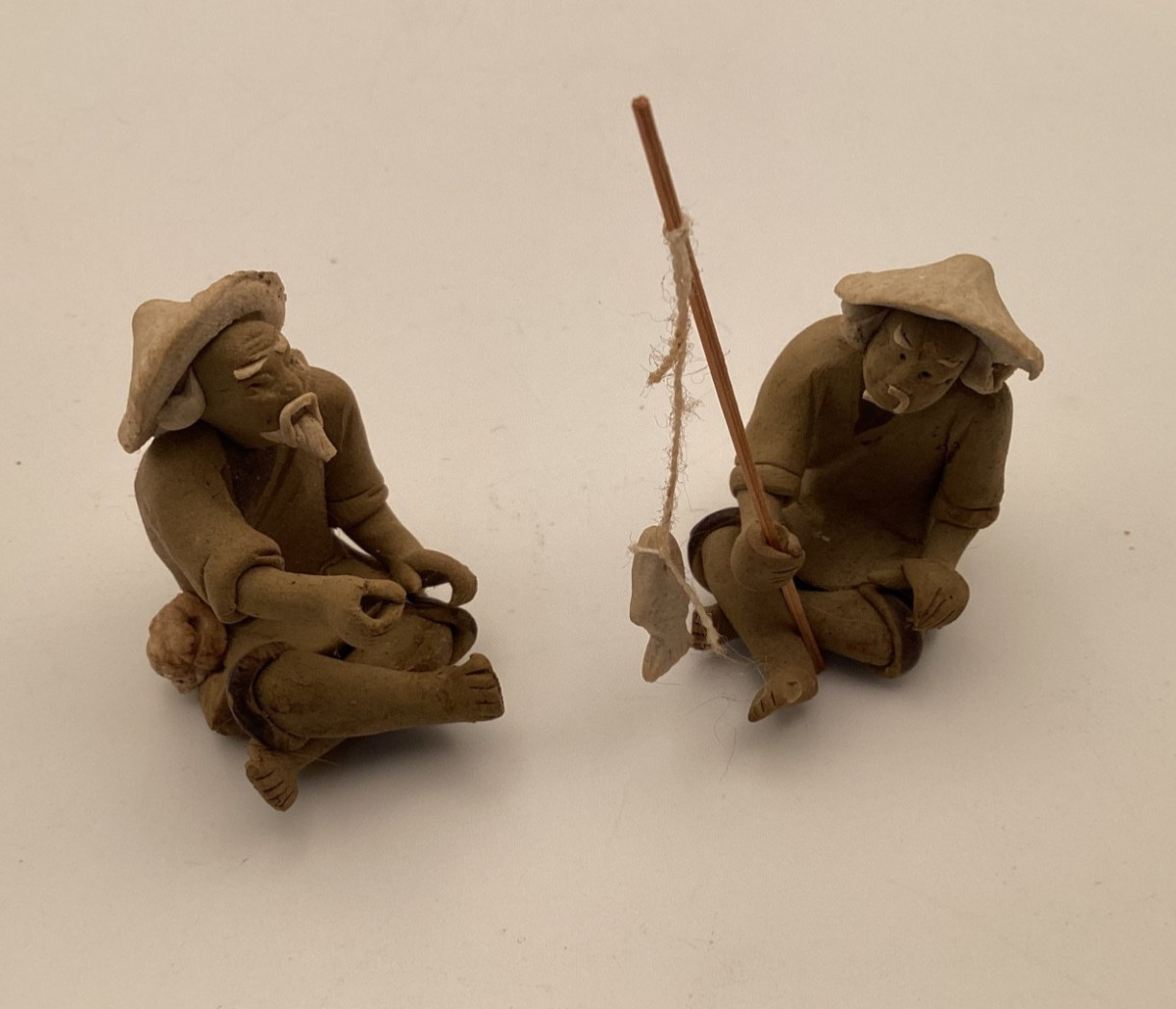 2 Vintage Mudman Pottery Chinese Clay Fishing Man Figurine 1 3/4” Tall Unmarked