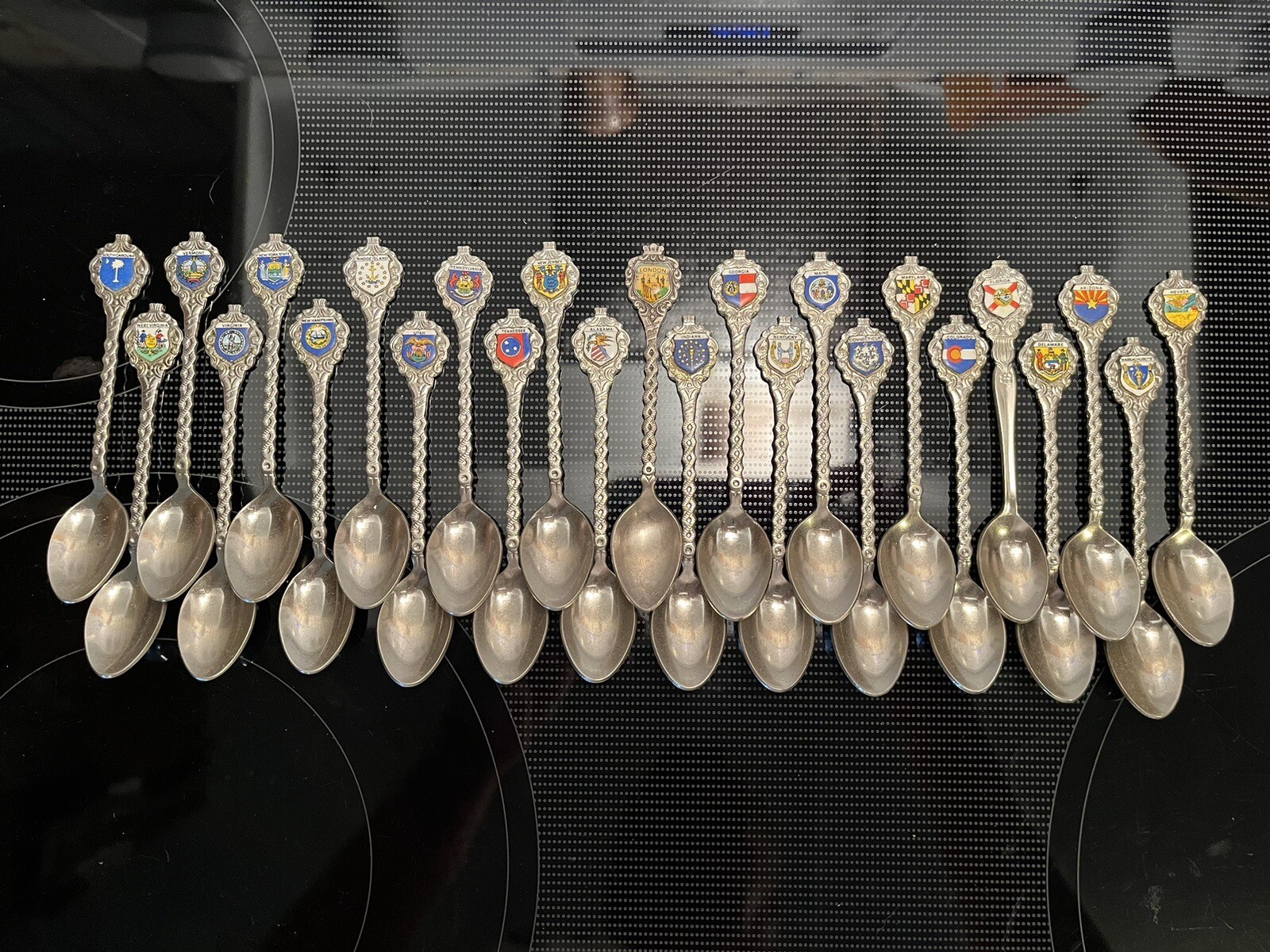 33 VTG Silver plated US and foreign souvenir spoons, lifetime collection