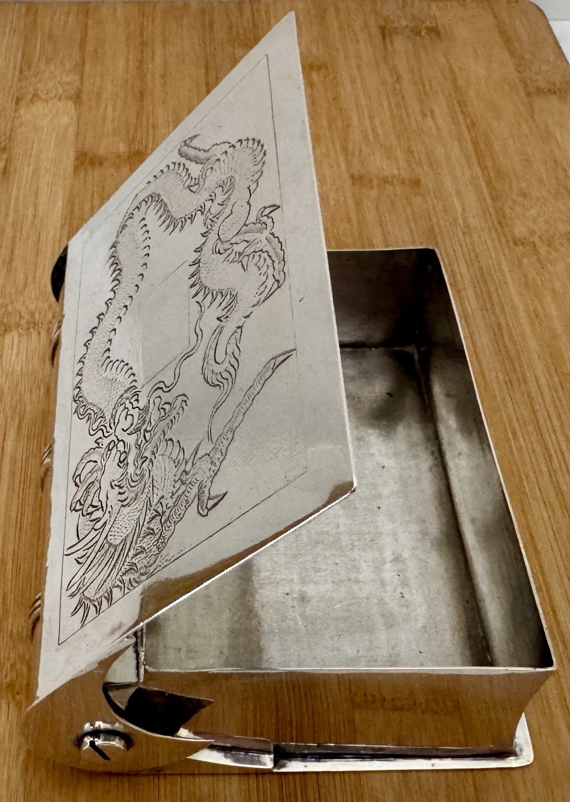 FIGURAL BOOK FORM STERLING SILVER TABLE BOX WITH ENGRAVED DRAGON ON IT’S LID