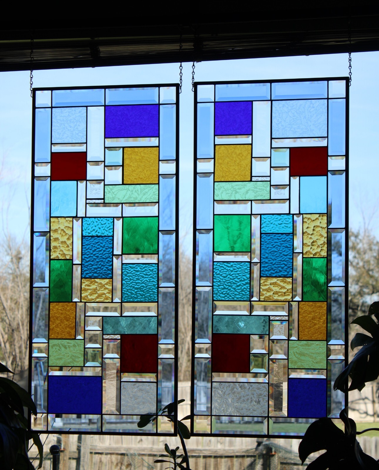 Stained Glass window pair, hanging panels each panel37.5×16.5 ” colored glass
