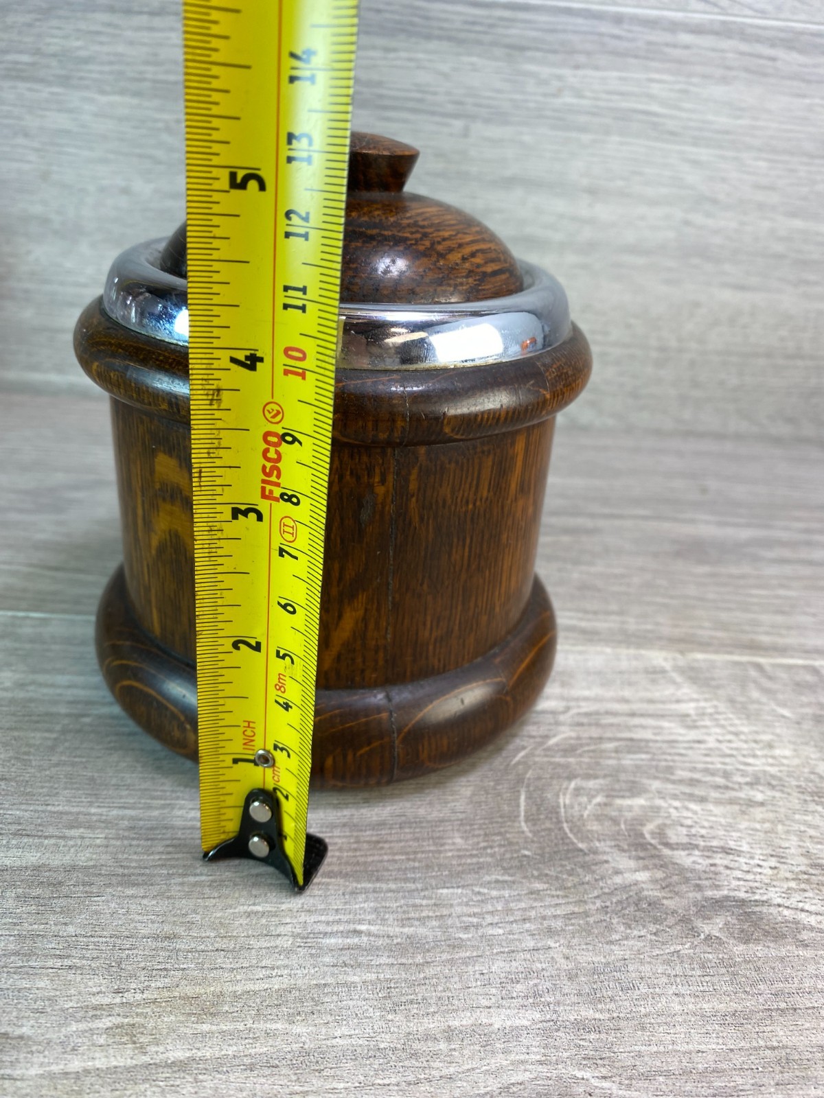 An early 20th century turned oak lidded tobacco jar with ceramic liner.