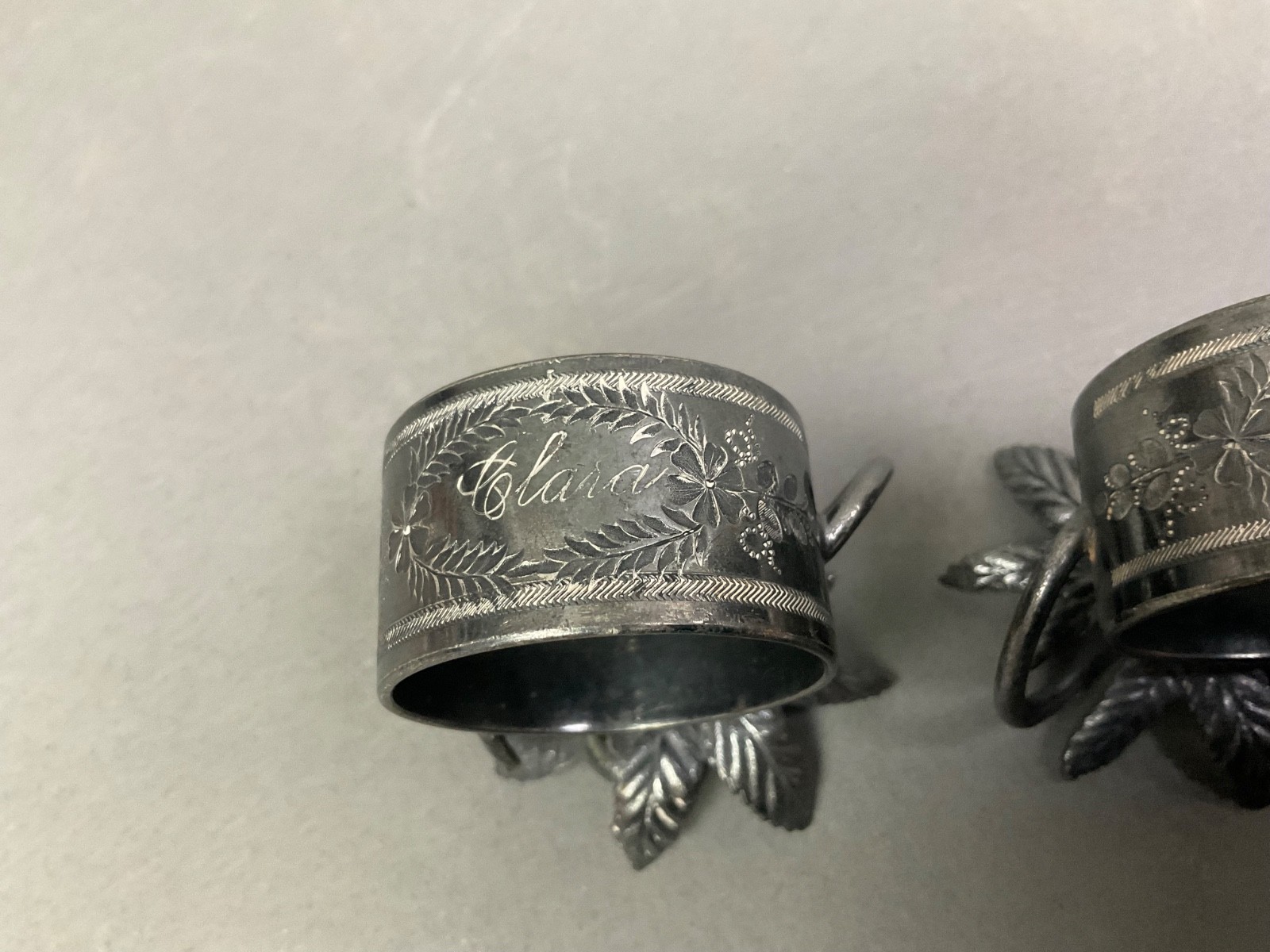 Pair ANTIQUE NAPKIN RING HOLDERS Figural Flower Silver Plated Monogrammed