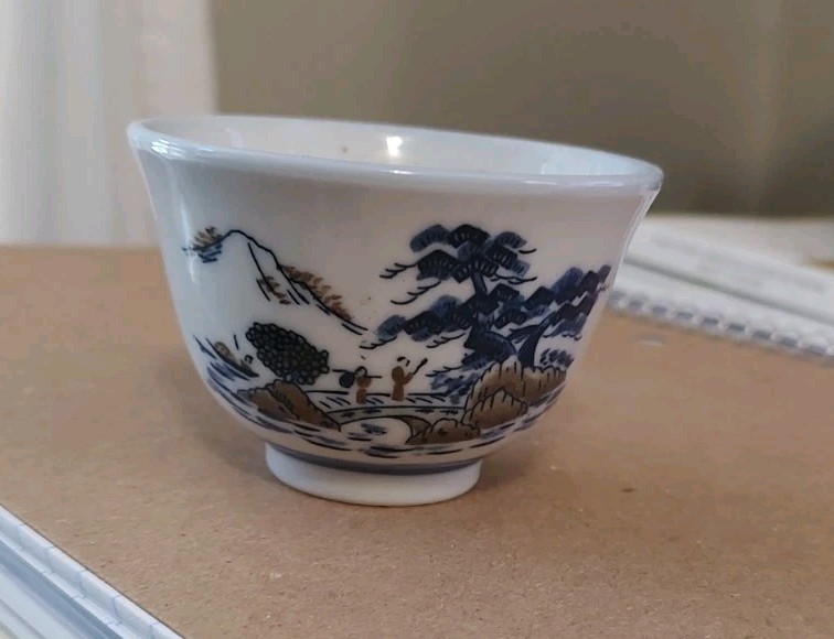 Small Blue And White Hand-painted Cup. Bronze Accents.