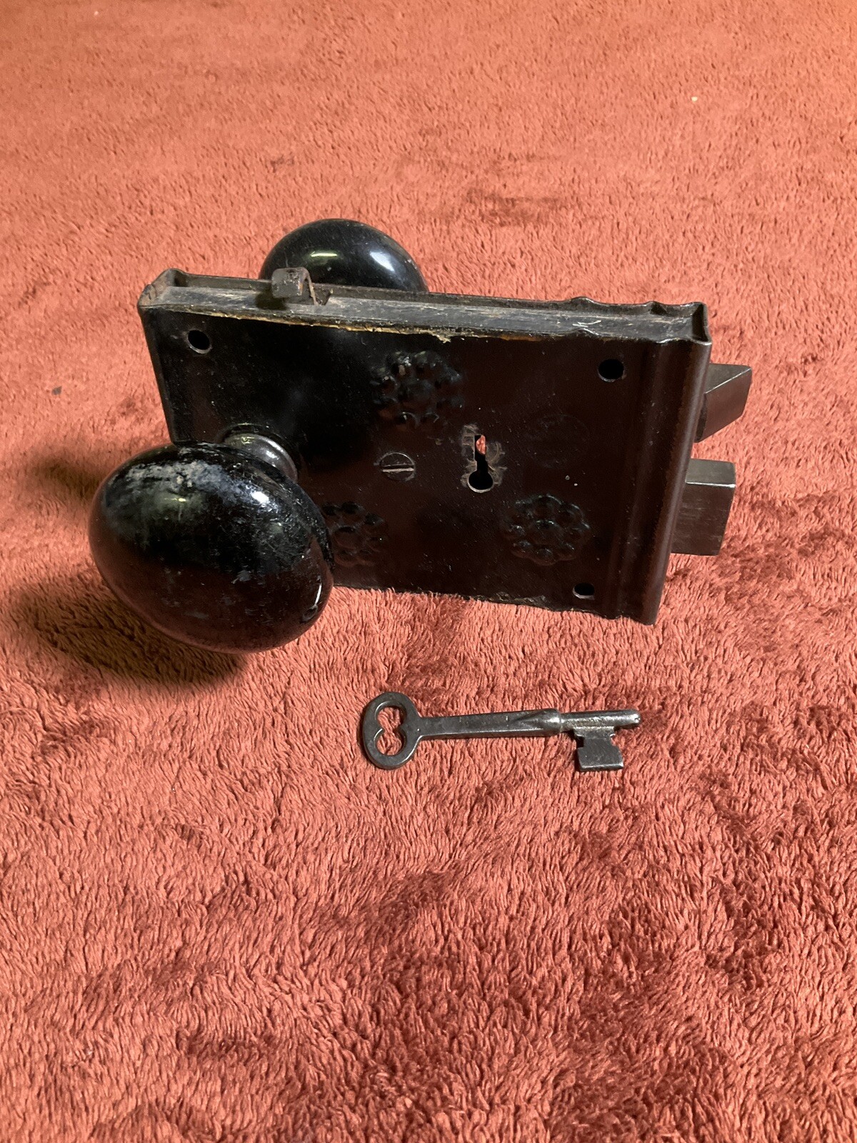 Antique Steel Rim Door Lockset, 2 Black Porcelain Knobs, 1 Key