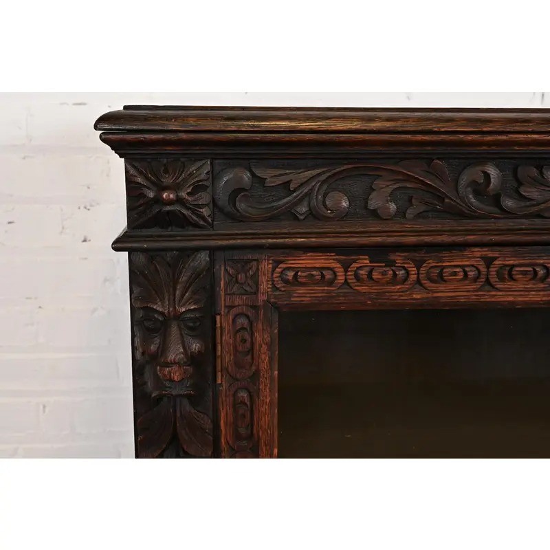 R. J. Horner Style Antique Victorian Carved Oak Bookcase Cabinet, Circa 1880s