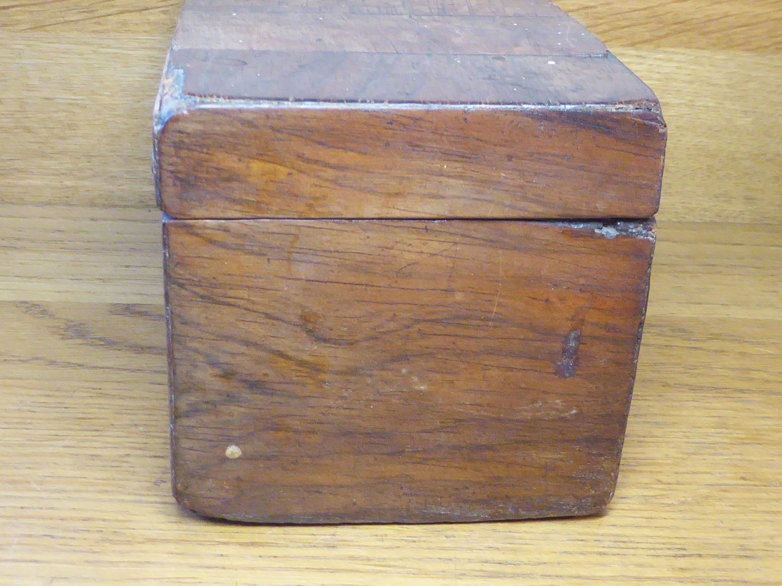Antique Tea Caddy . Rectangular box with striped blocks of Veneer.2 compartments