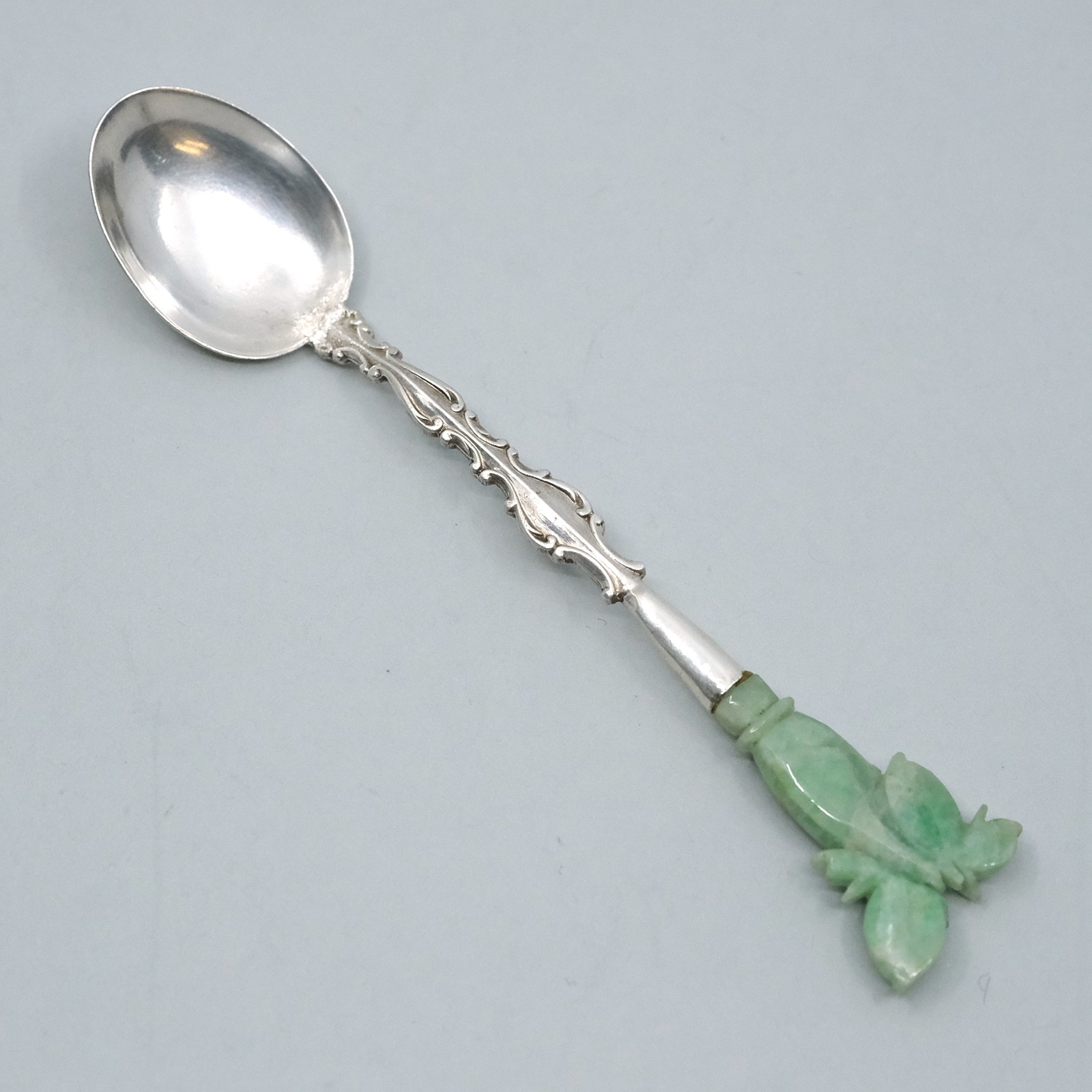 Chinese Silver 4 1/8″ Spoon with Figural Jade Hand Holding Flower